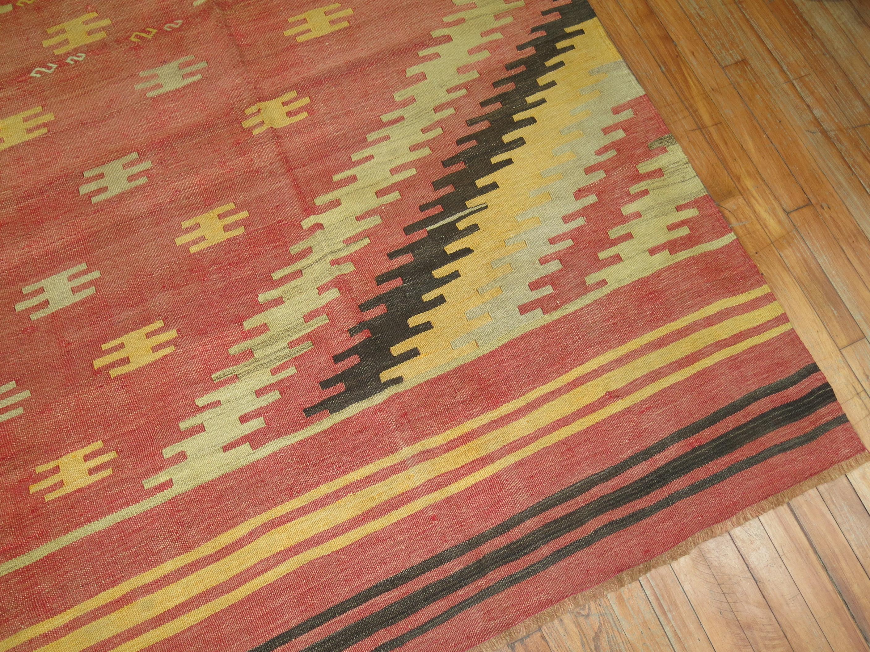 A square room size mid-20th century Turkish Kilim flat-weave.

9'4'' x 10'6''