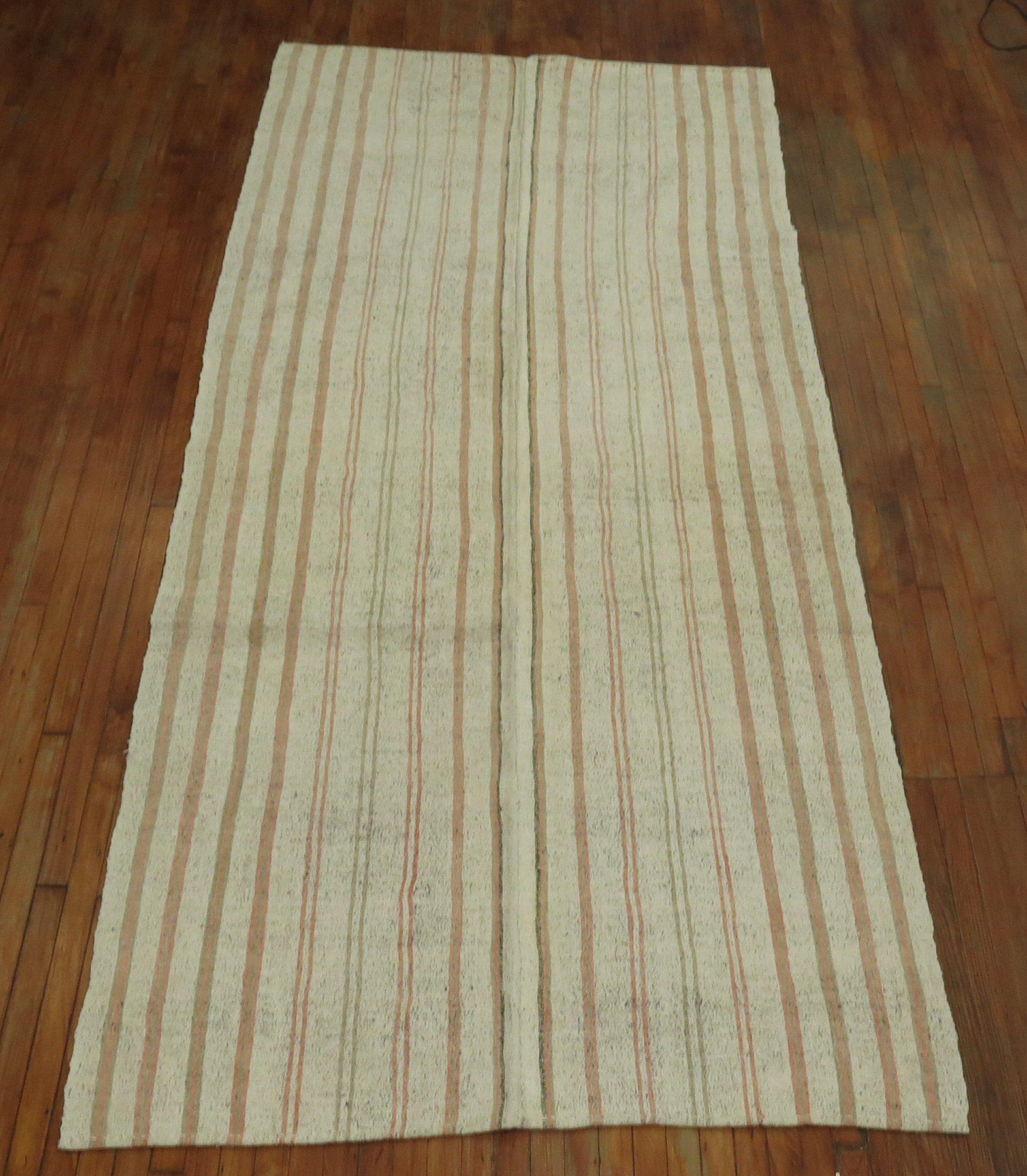 Gallery size midcentury Turkish Kilim in brown, peach accents on a white ground. Suitable for a beach home.