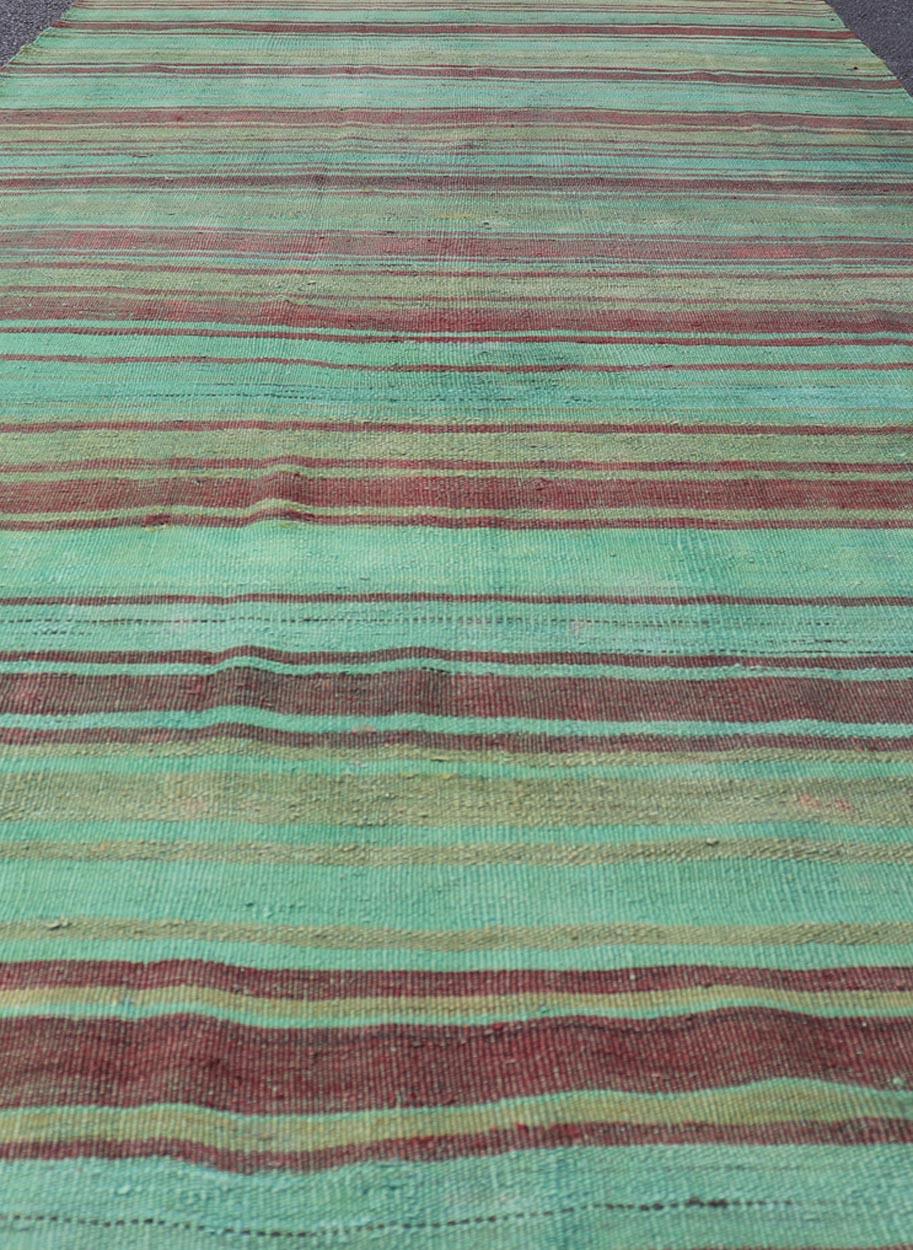 Measures: 4'3 x 11'2 
Vintage Turkish Kilim Gallery Rug with Vibrant Green, Brown Stripes 4'3