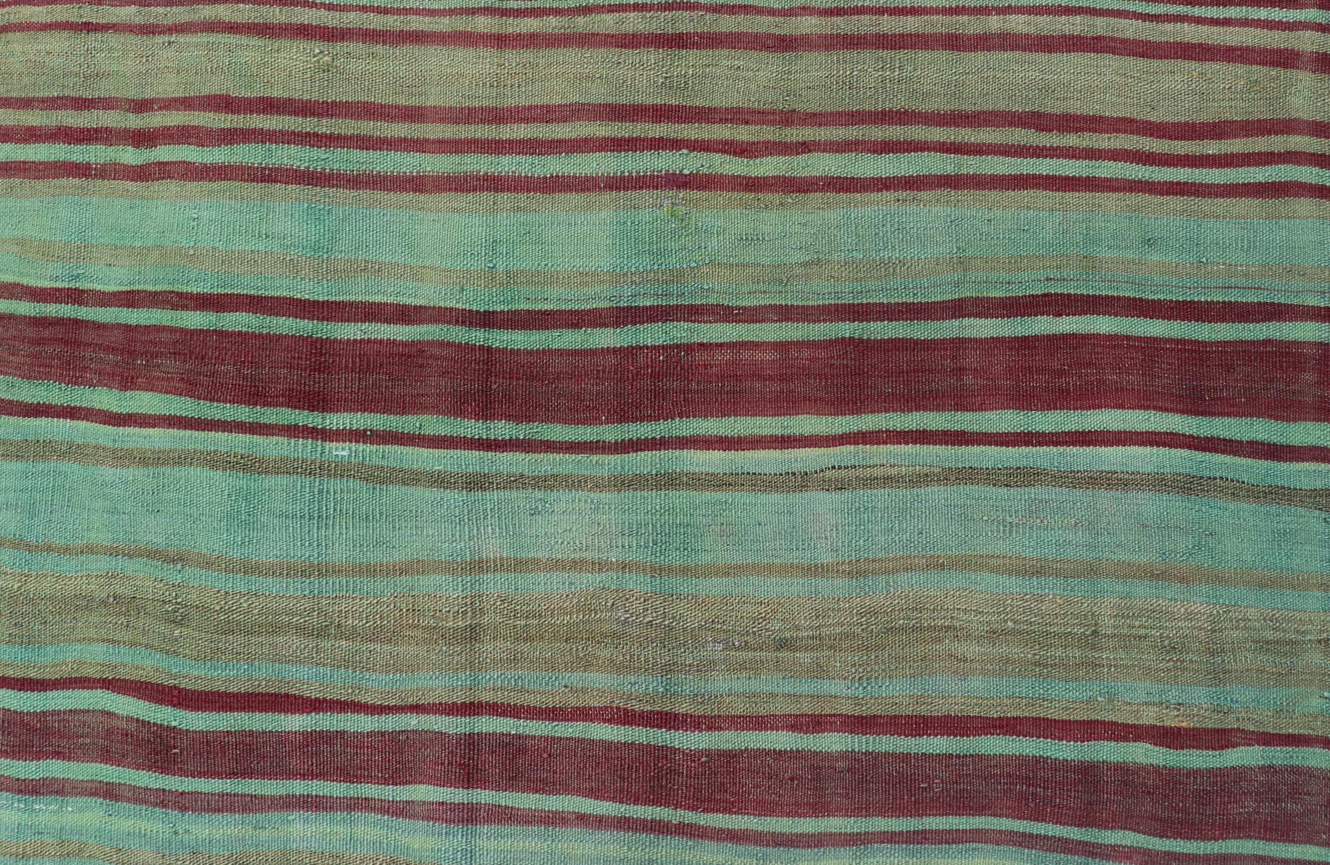 20th Century Vintage Turkish Kilim Gallery Rug with Vibrant Green, Brown Stripes 4'3