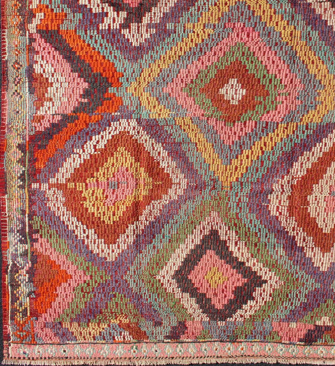 Vintage Turkish Kilim Jajim Rug with Broken Diamond Pattern and Vibrant Colors,  rug / Tu-Ned-128,
This wonderful Turkish Jajeem from the 1950s features a multi-diamond pattern rendered in a chic color palette. The broken diamond pattern, along with