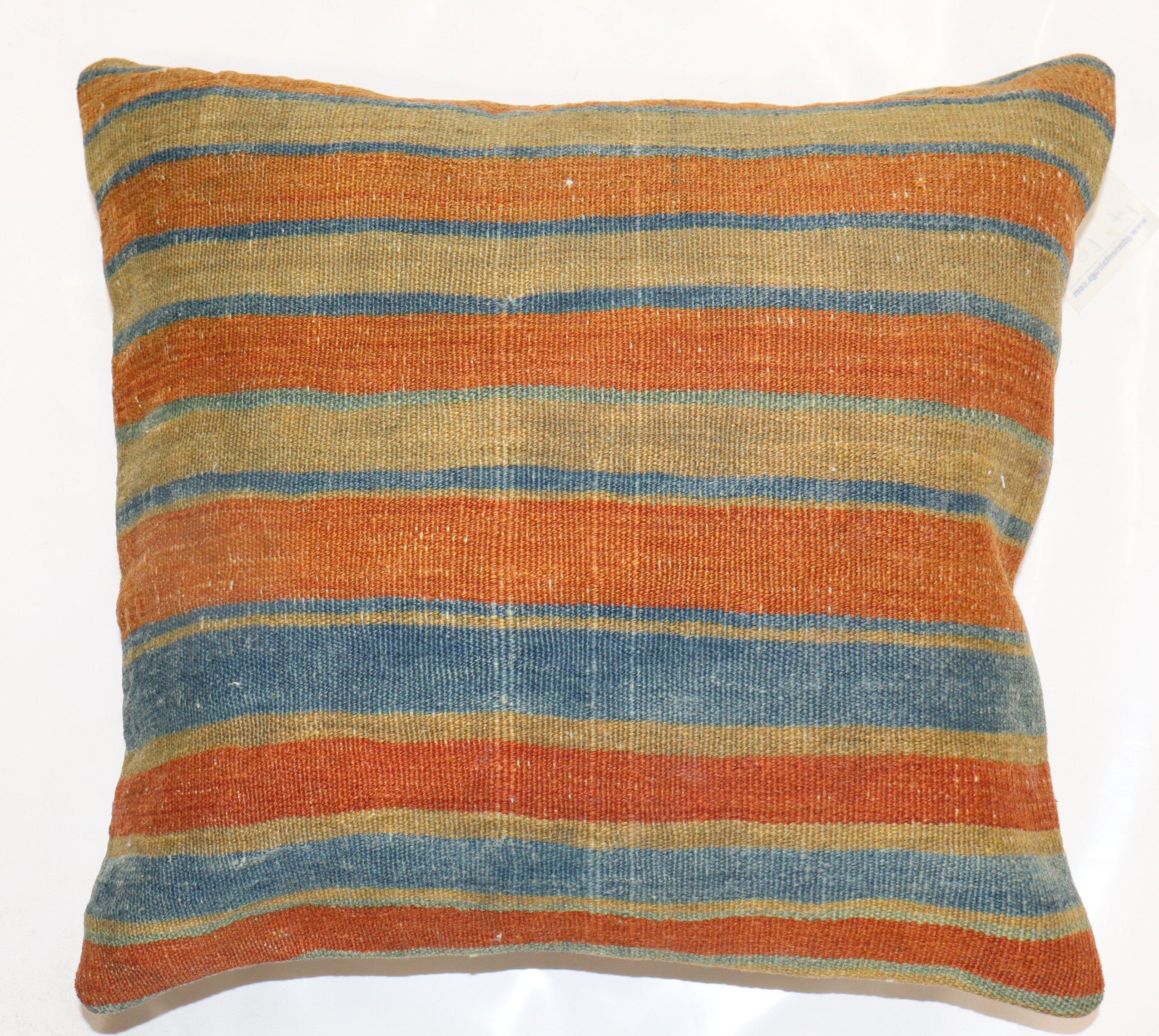 Pillow made from a vintage Turkish Kilim with cotton back. Zipper closure and foam insert provided. 

Measures: 16'' x 18''.