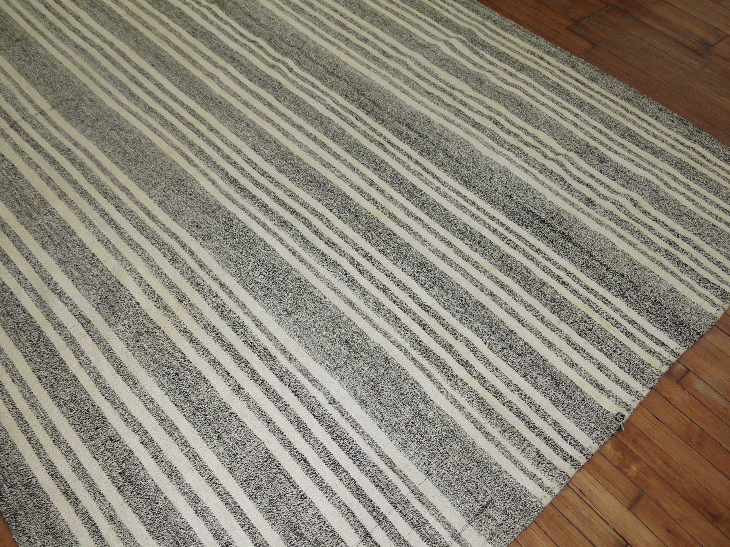 Vintage Turkish Kilim in gray and white.