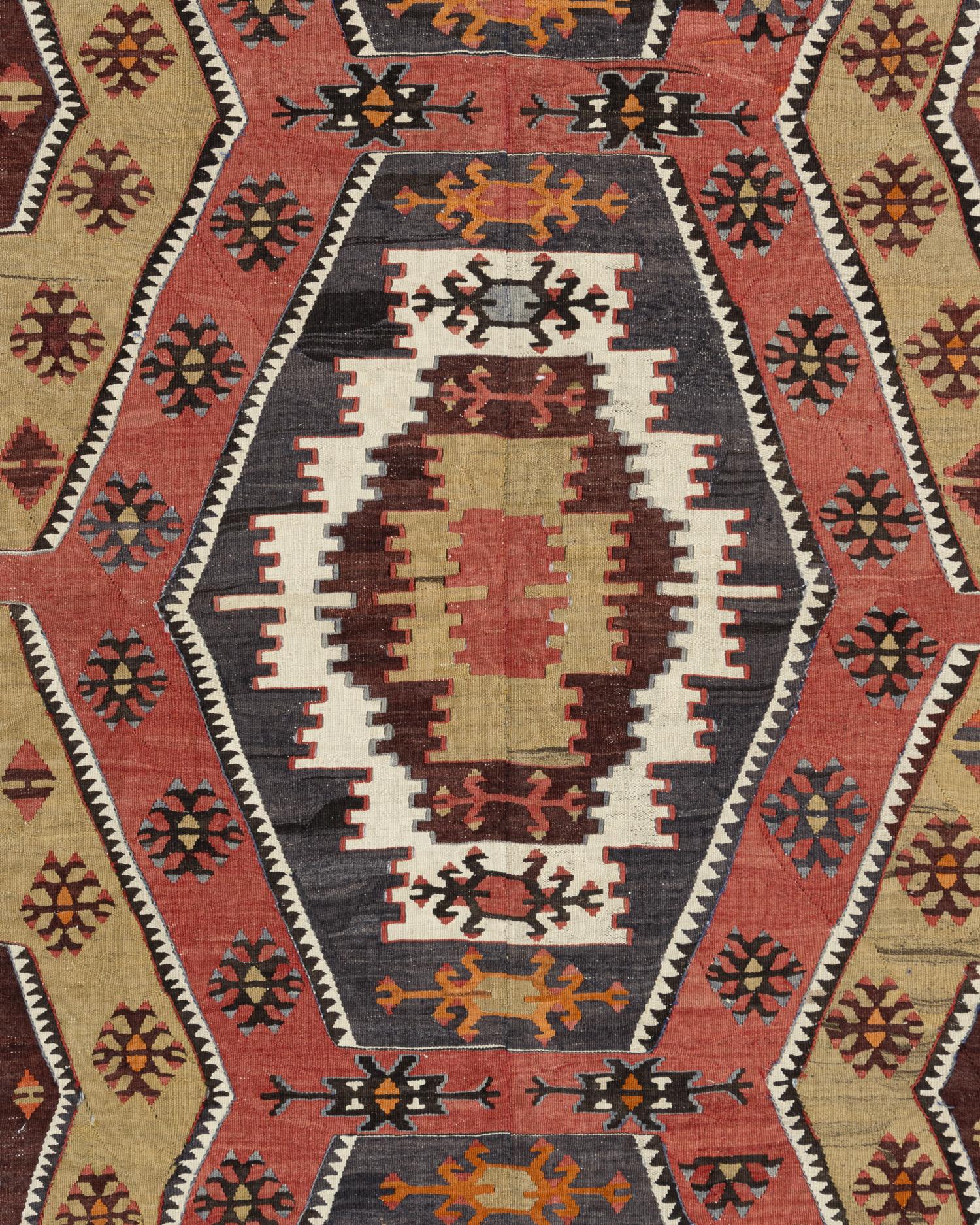 Vintage Turkish Kilim rug 4'11 X 11'9. This vintage Turkish flat weave Kilim was hand-woven in the 1940's. The simplicity and boldness of this piece can also give a contemporary feel and is able to look at home in both a modern and traditional