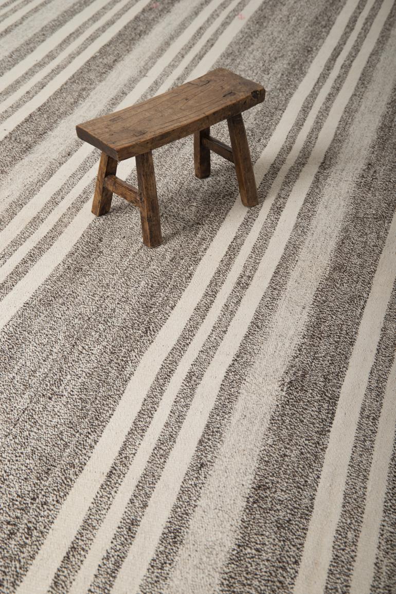 Would you like a room to appear larger ? Use a rug with vertical stripes. This industry secret have been used by many professionals. A floor-cover with vertical stripes not only elongates and enhances the flow of a room but it even modernizes the