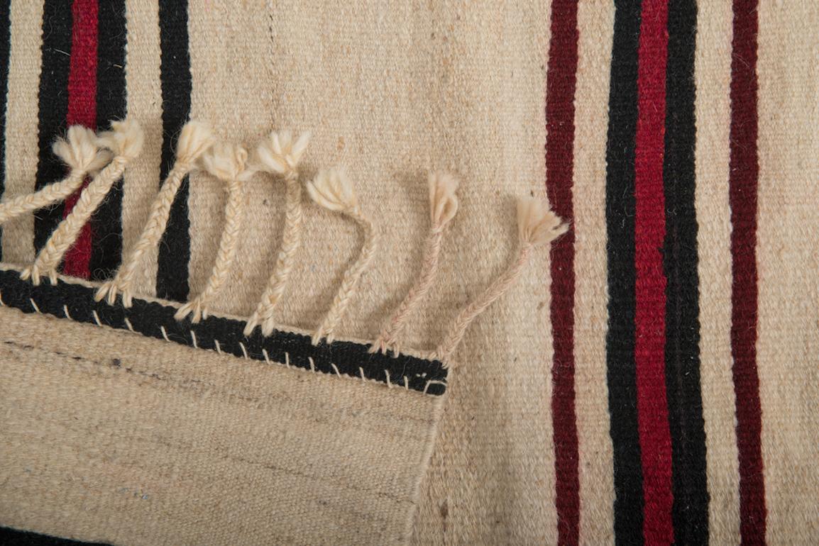 This Turkish Kilim features 2 vintage panels that have been stitched together in order to form a captivating visual effect. This remarkable flat-weave is impeccably constructed from handwoven wool in eastern Turkey. Size can be adjusted.



    