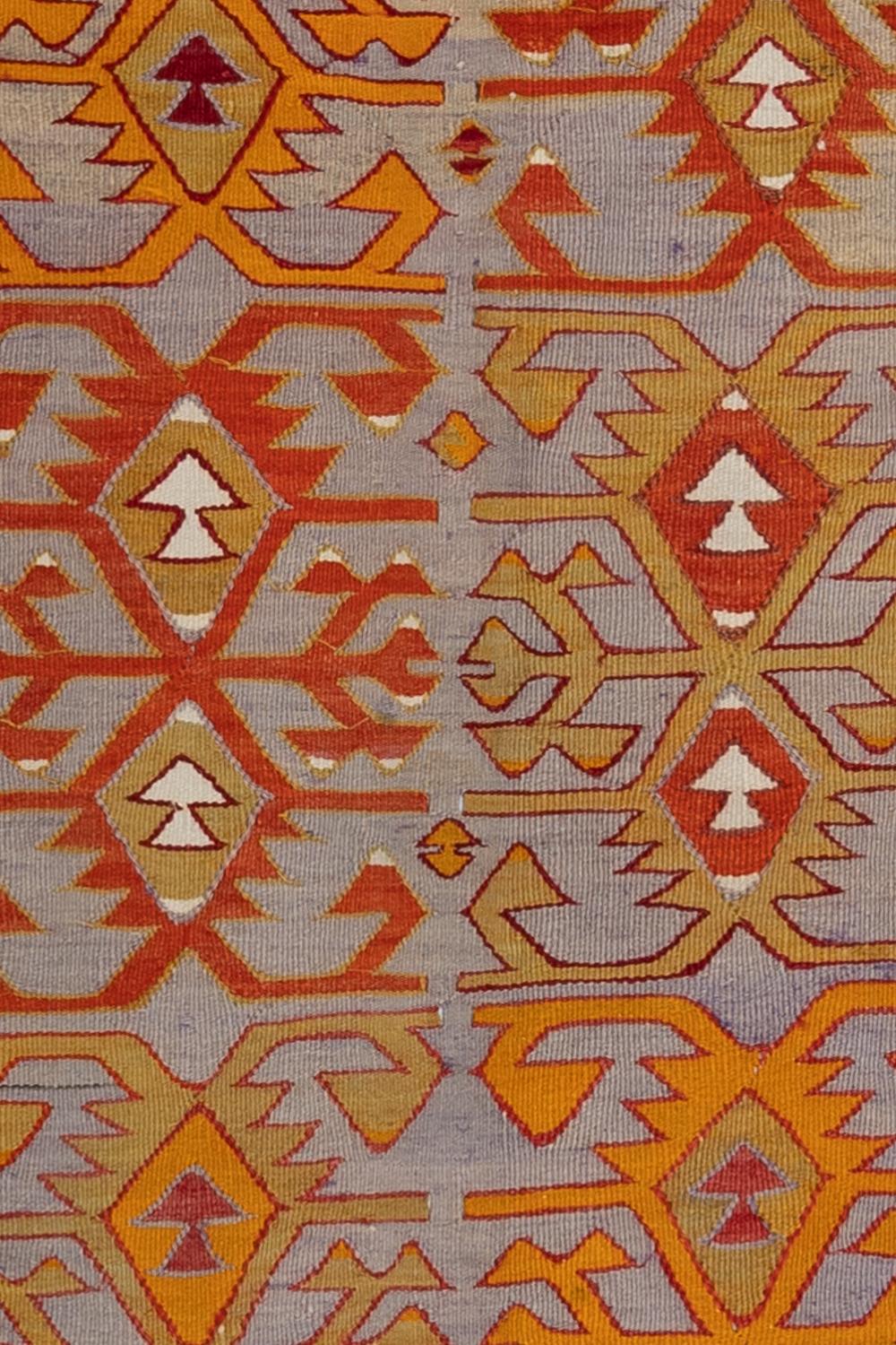 Anatolian Kilim, circa 1950.

Wear notes: none

Vintage rugs are made by hand over the course of months, sometimes years. Their imperfections and wear are evidence of the hard working human hands that made them and the generations of families