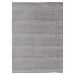 Rug 
Kilim Vintage en beige et crème à rayures et tons 3
7 x 5
2