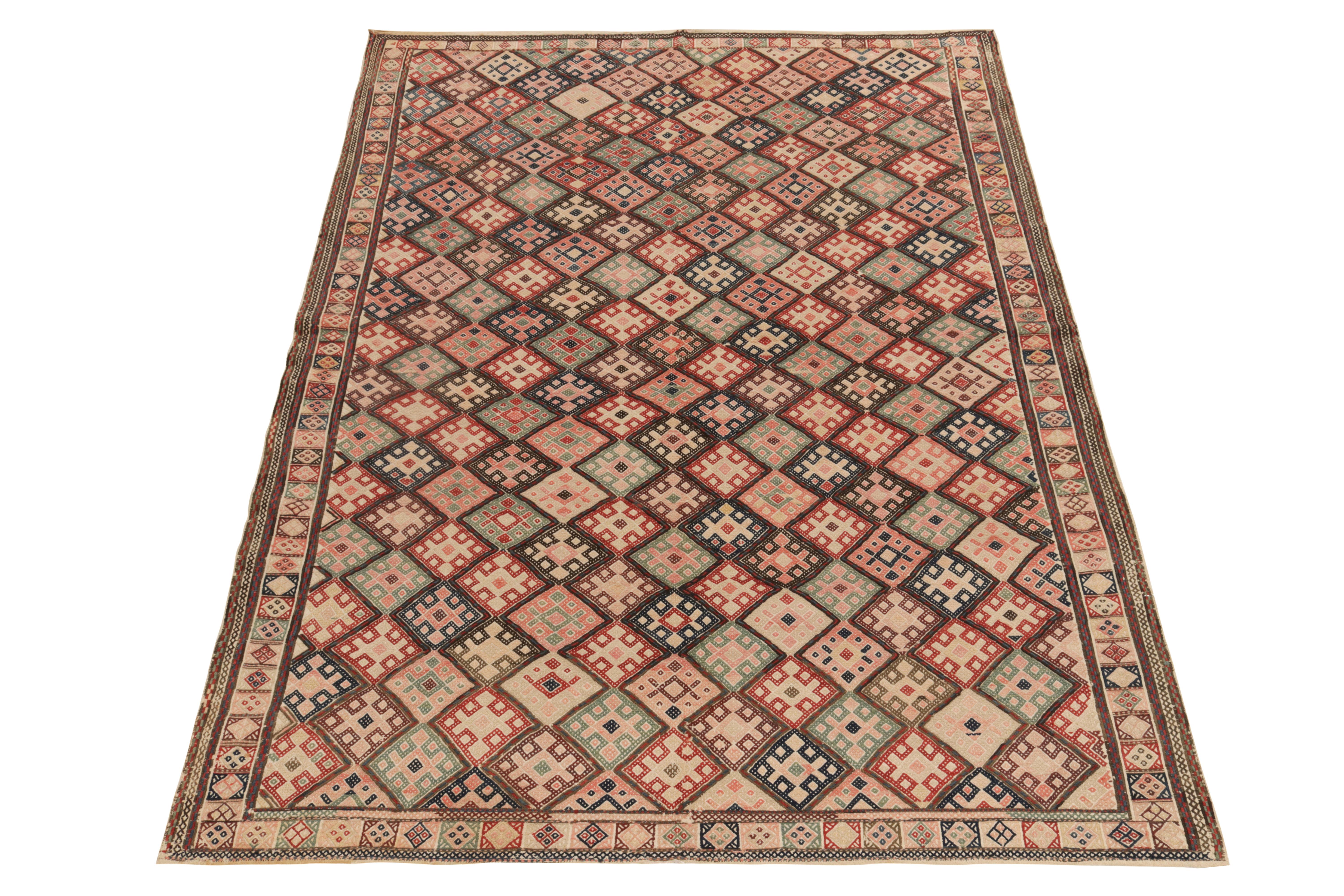 Handwoven in fine wool, a 5x8 vintage kilim rug from Turkey, now joining our Kilim & Flatweave collection. Rustic in appeal, the 1950s piece reflects a flamboyant approach in tribal design with an all over diamond pattern encasing traditional motifs