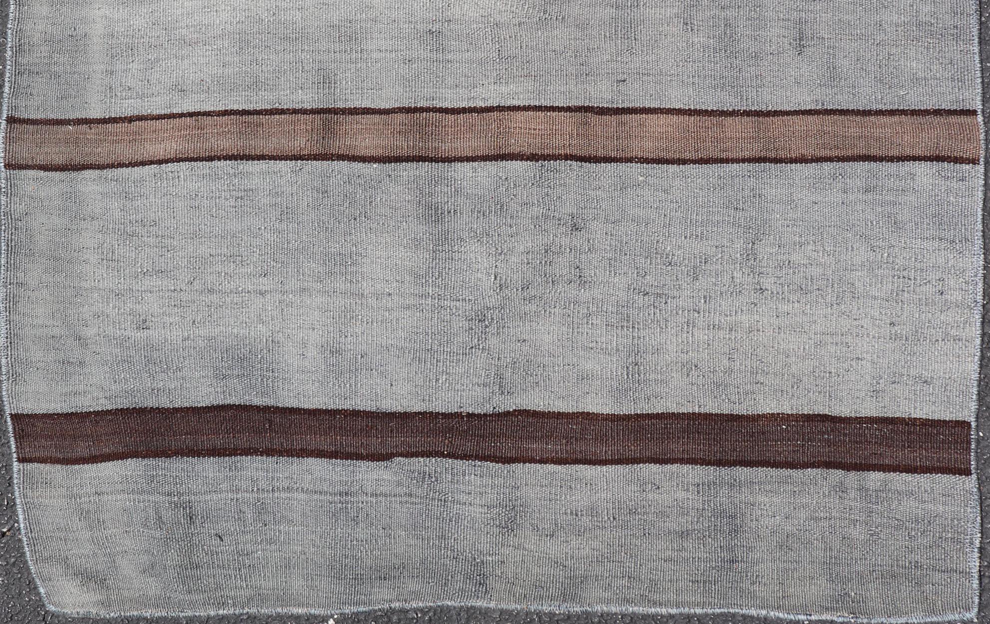 Measures: 2'10 x 3'0 

Vintage Turkish Kilim Rug in Gray with Dark Brown Horizontal Stripe 2'10 x 3'0. Keivan Woven Arts / rug/KBE-EN-15337, country of origin / type: Turkey / Kilim, circa 1950. 

This vintage Turkish Kilim rug highlights a simple