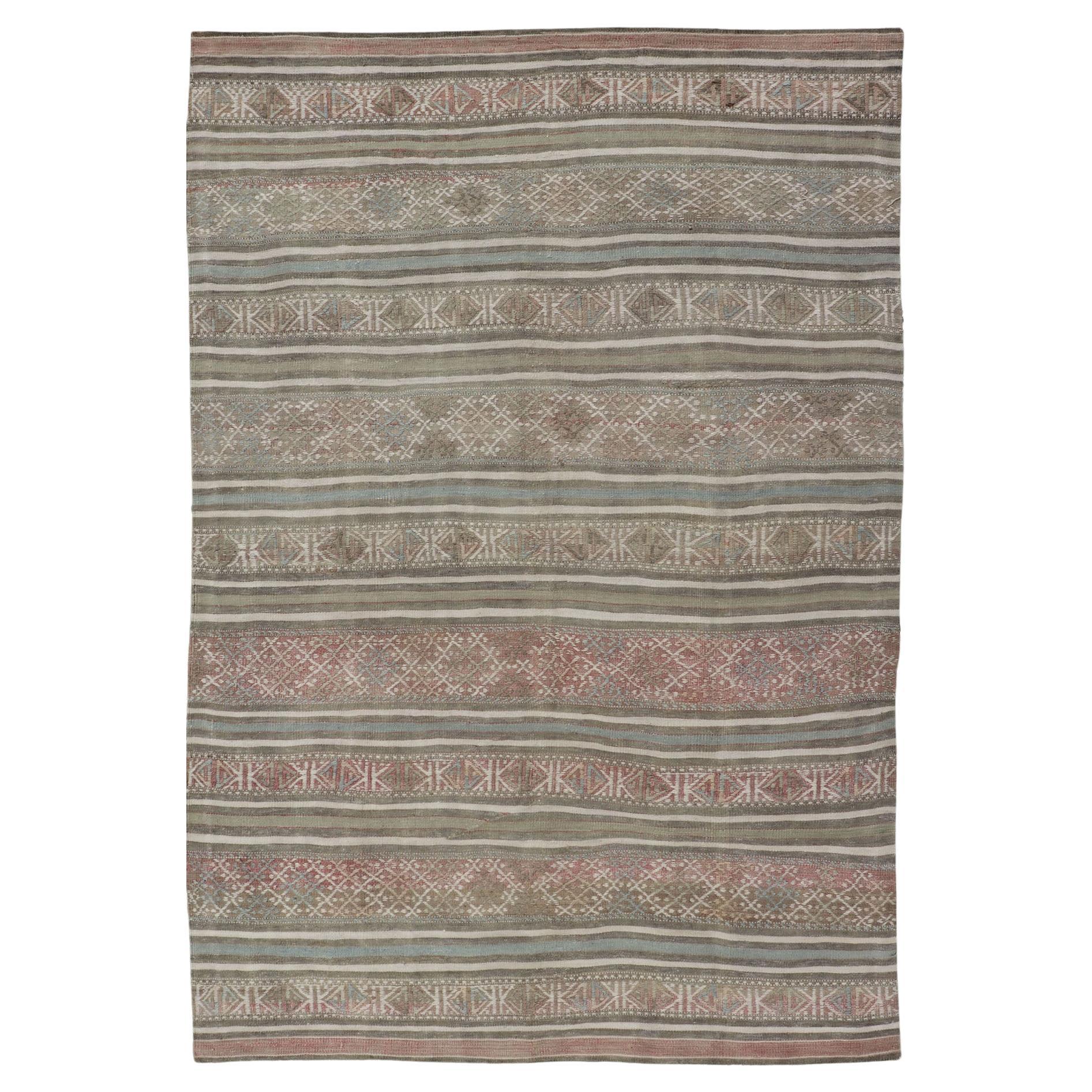 Vintage Turkish Kilim Rug in Muted Brown, Blue, and Rose Striped Design5
3 x 7
9 in vendita