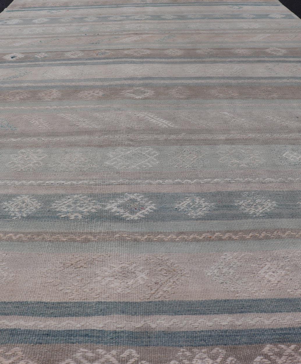 Hand-Woven Vintage Turkish Kilim Rug In Soft Pastel Stripes and Geometric Patten 5'3 x 9'9 For Sale