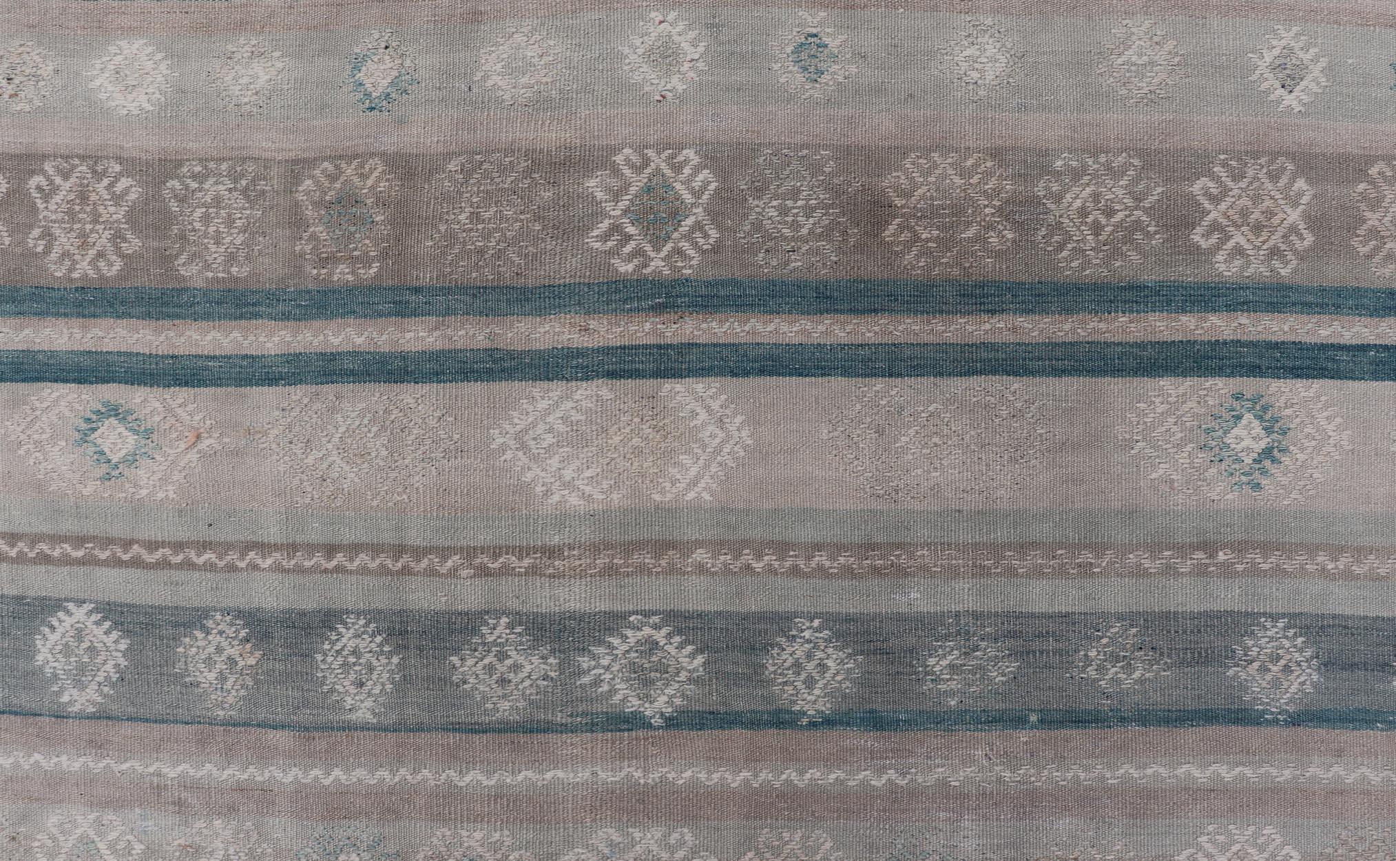 Wool Vintage Turkish Kilim Rug In Soft Pastel Stripes and Geometric Patten 5'3 x 9'9 For Sale