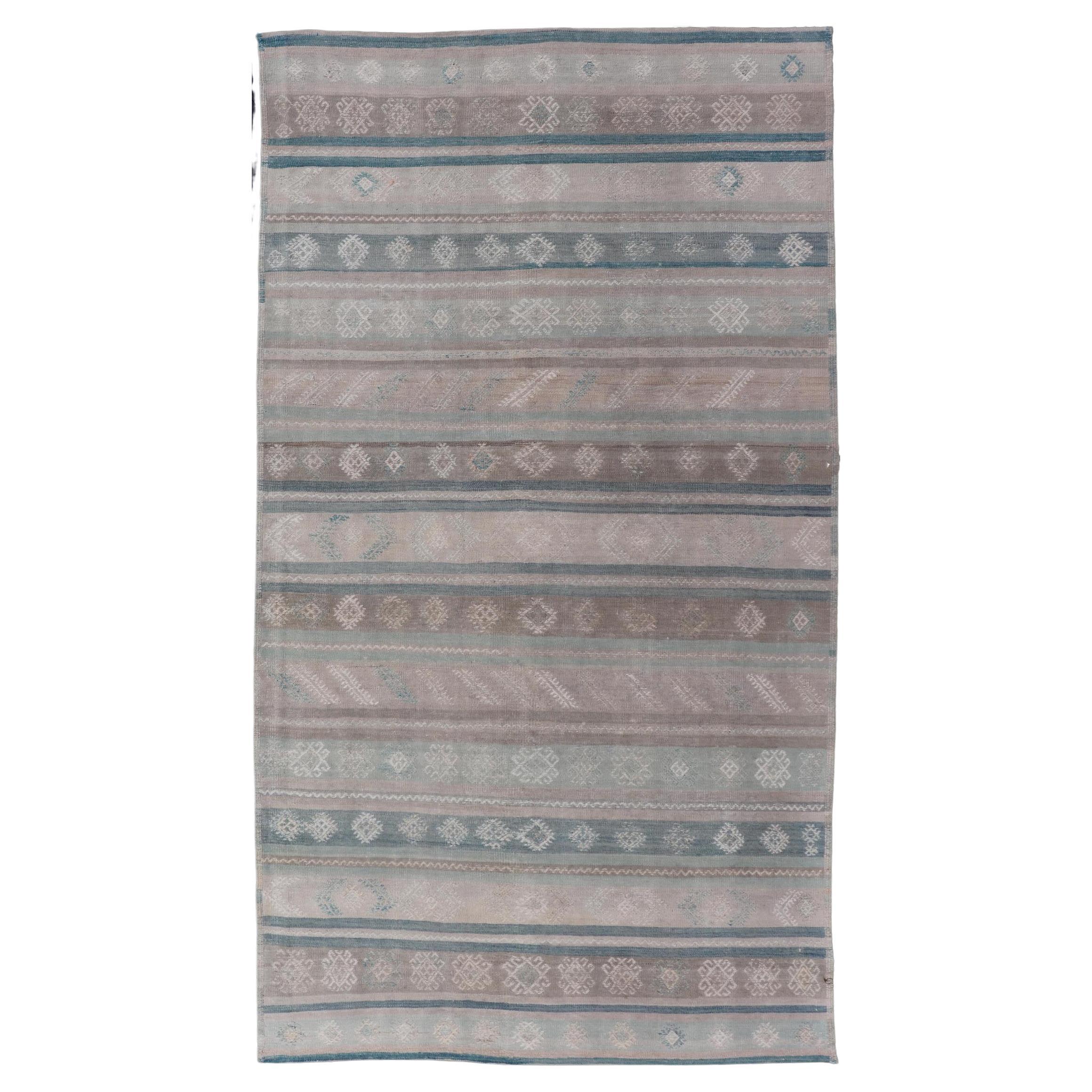 Vintage Turkish Kilim Rug In Soft Pastel Stripes and Geometric Patten 5'3 x 9'9 For Sale