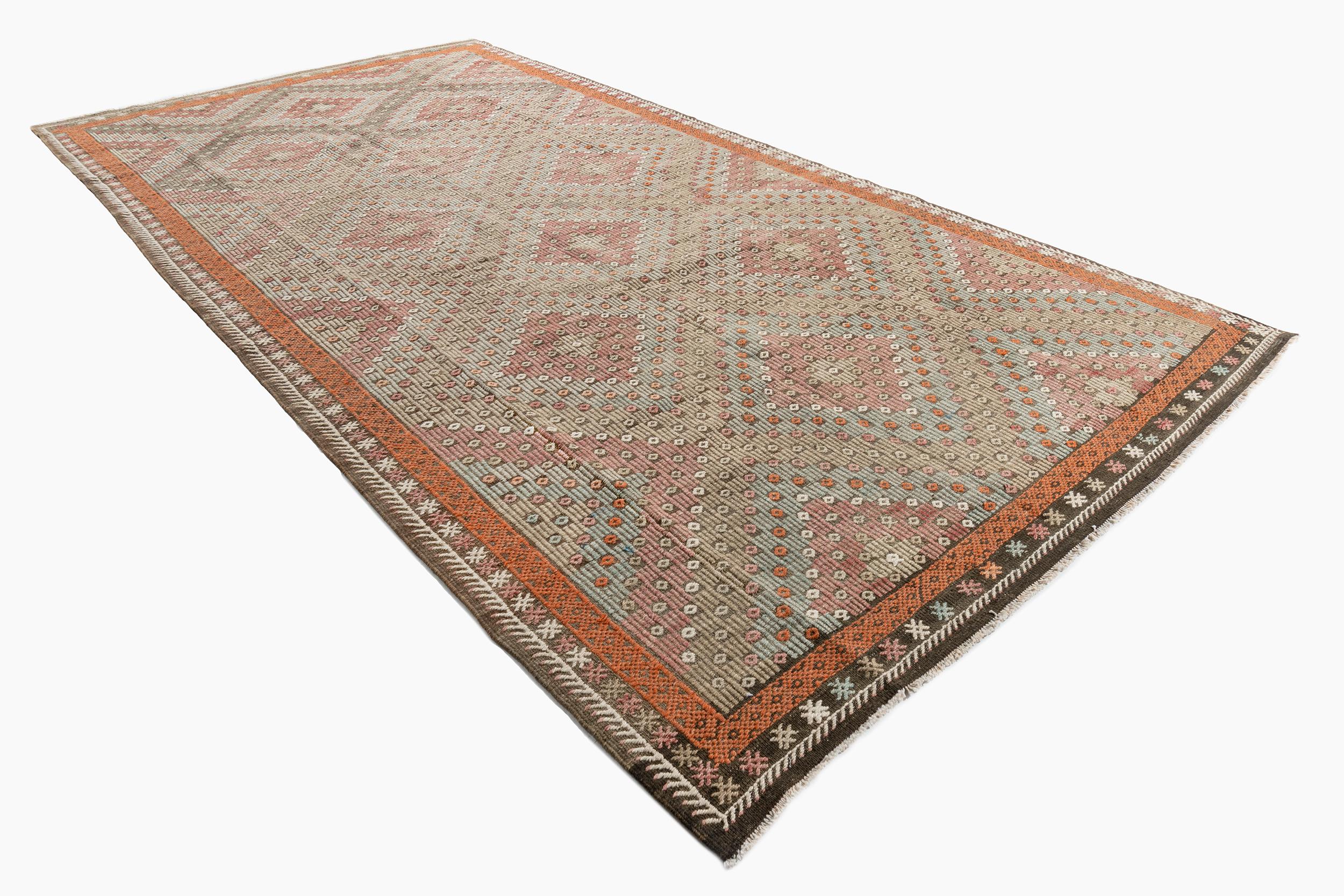 Vintage Turkish Kilim Rug Runner 6'2 X 12'. This vintage Turkish flat weave Kilim was hand-woven in the 1940's. The simplicity and boldness of this piece can also give a contemporary feel and is able to look at home in both a modern and traditional