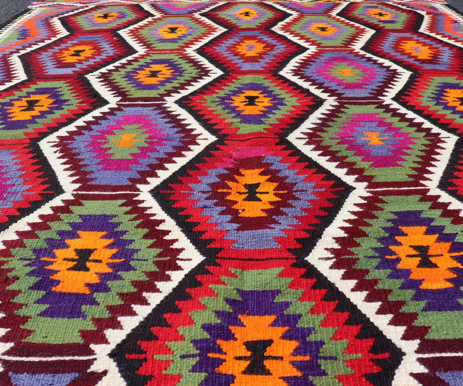 Measures: 6'0 x 7'8 
Vintage Turkish Kilim Rug with Bold Geometric Tribal Hexagon Motifs 6'0 x 7'8. Keivan Woven Arts / rug/B25-0415-311, country of origin / type: Turkey / Kilim, circa 1950. 

This vintage Turkish Kilim rug captivates with a