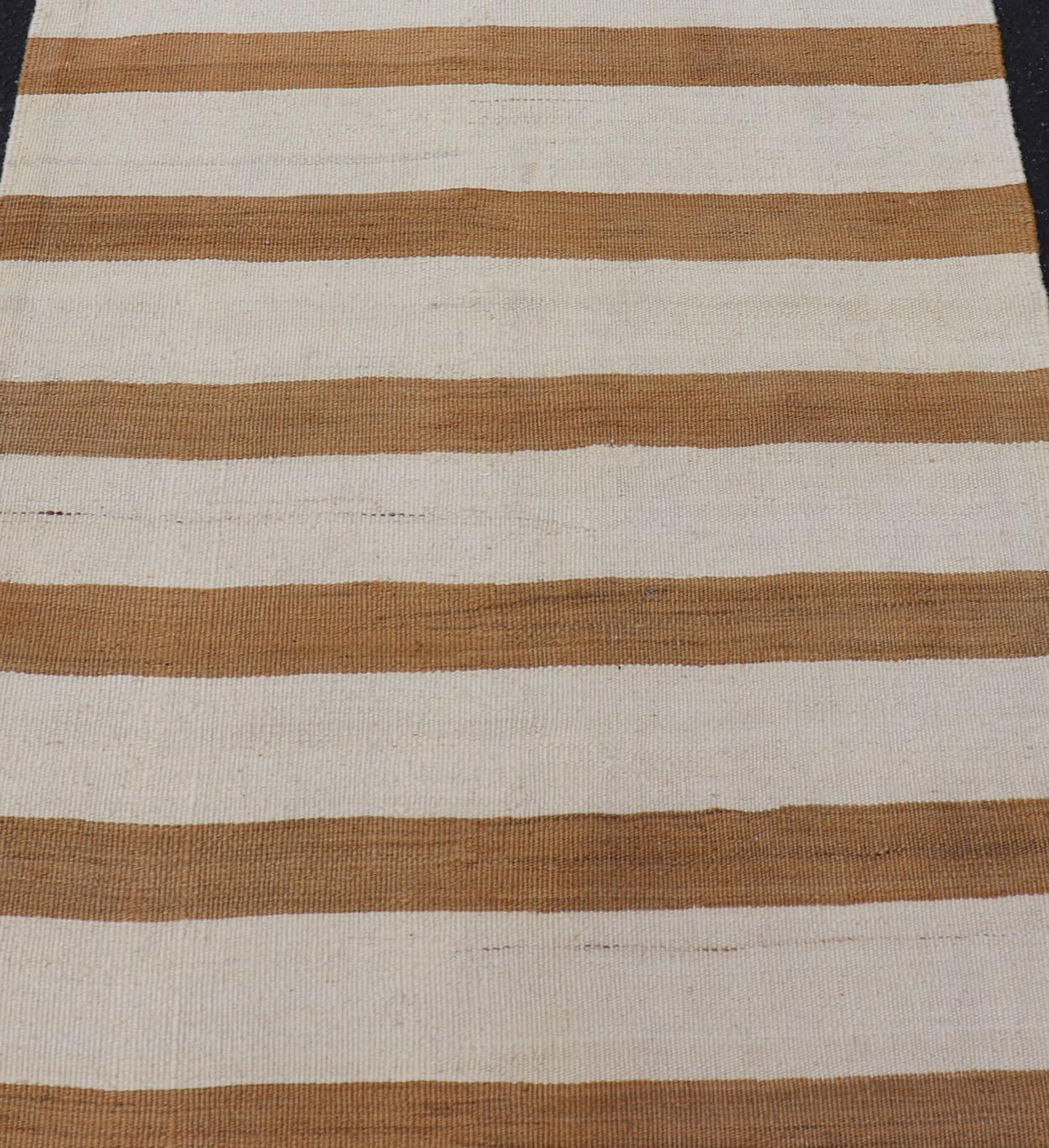 Vintage Turkish Kilim Rug with Horizontal Stripes in Light Brown, caramel and light Cream. Keivan Woven Arts rug EN-179886, country of origin / type: Turkey / Kilim, circa Mid-20th Century.

Measures: 2'5 x 8'5 

This vintage flat-woven kilim short