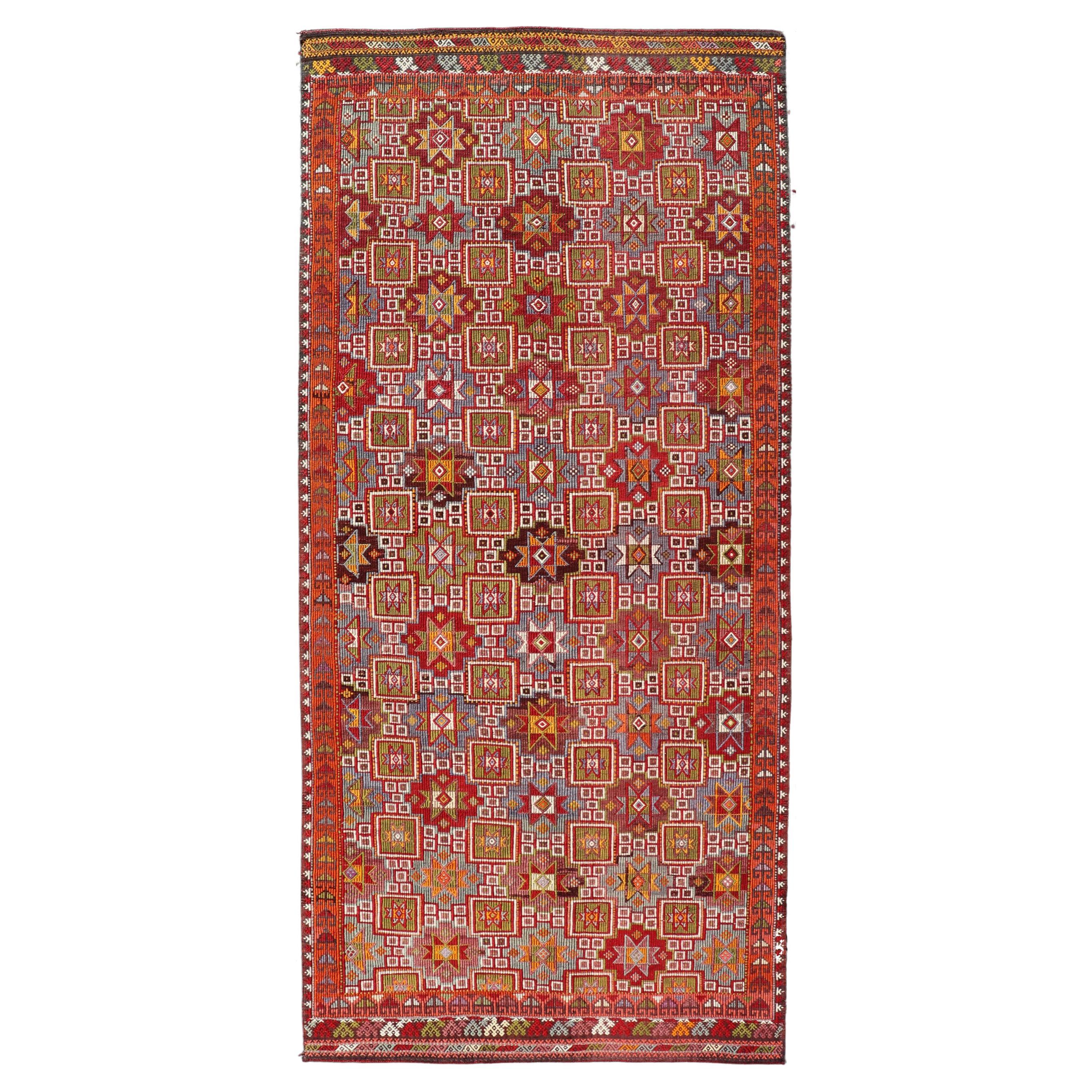 Rug & Kilim turco vintage con motivi rossi e multicolori 4'6" x 10'2"