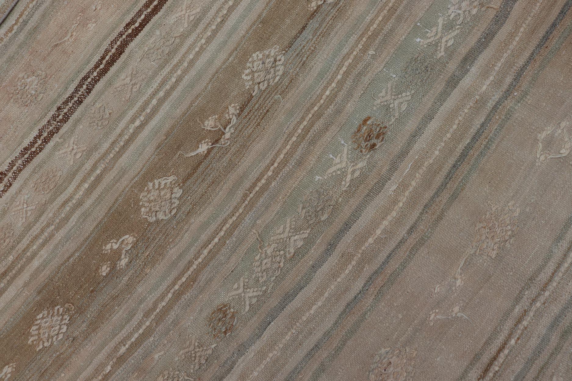 Measures: 6'0 x 11'0 
Vintage Turkish Kilim Rug With Soft Beige and Pastel Accents 6'0 x 11'0. Keivan Woven Arts / Rug / EN-15429 Country of origin / type: Turkey / Kilim

This rug features a delicate interplay of light beige and muted pastel