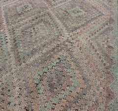 Vintage Turkish Kilim Rug with Soft Geometric Diamond Pattern in Muted Pastel