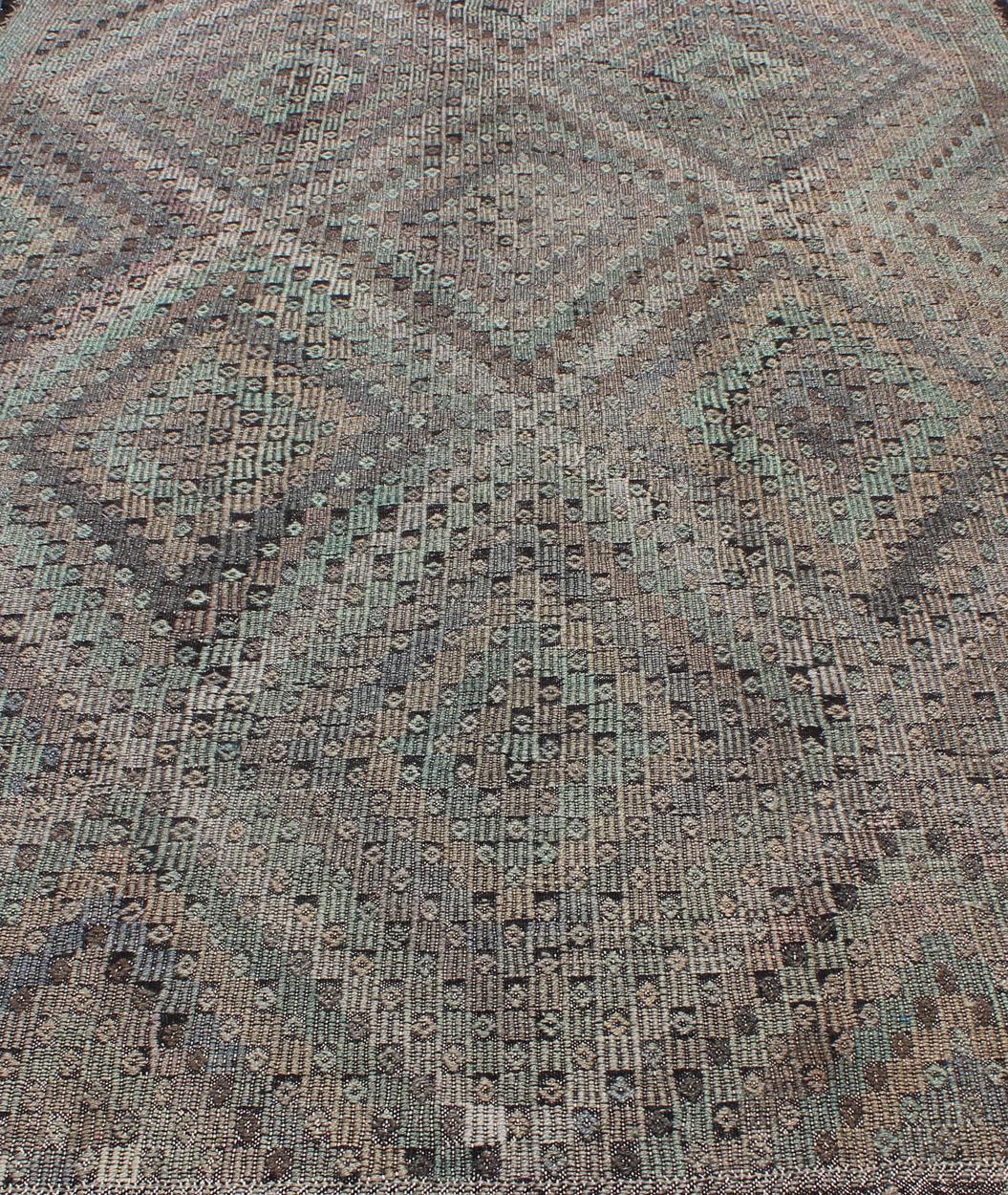 Hand-Woven Vintage Turkish Kilim Rug with Soft Geometric Diamond Pattern in Muted Pastel For Sale