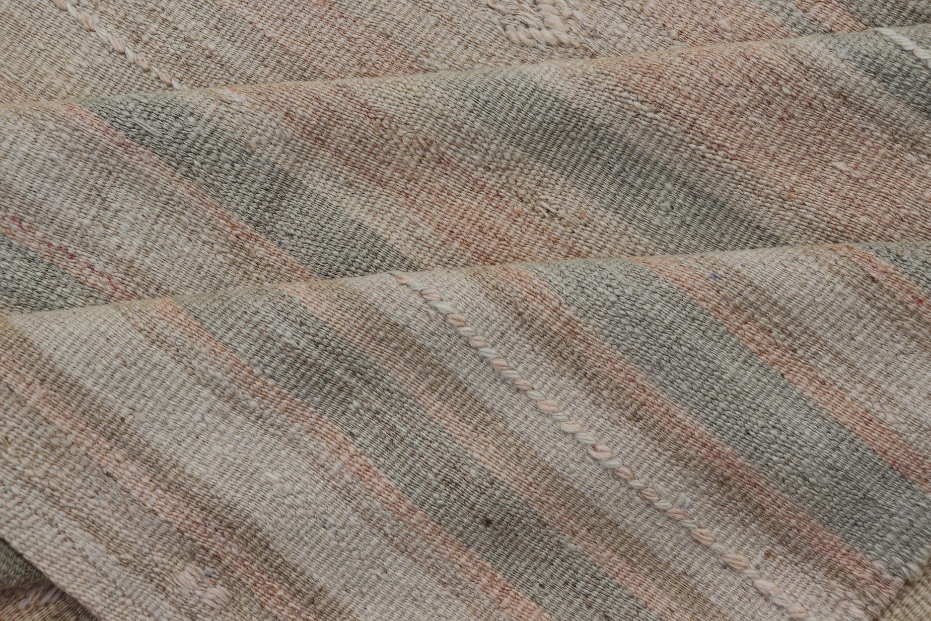 Vintage Turkish Kilim Rug with Soft Pastel Stripes and Earthy Tones 4'11