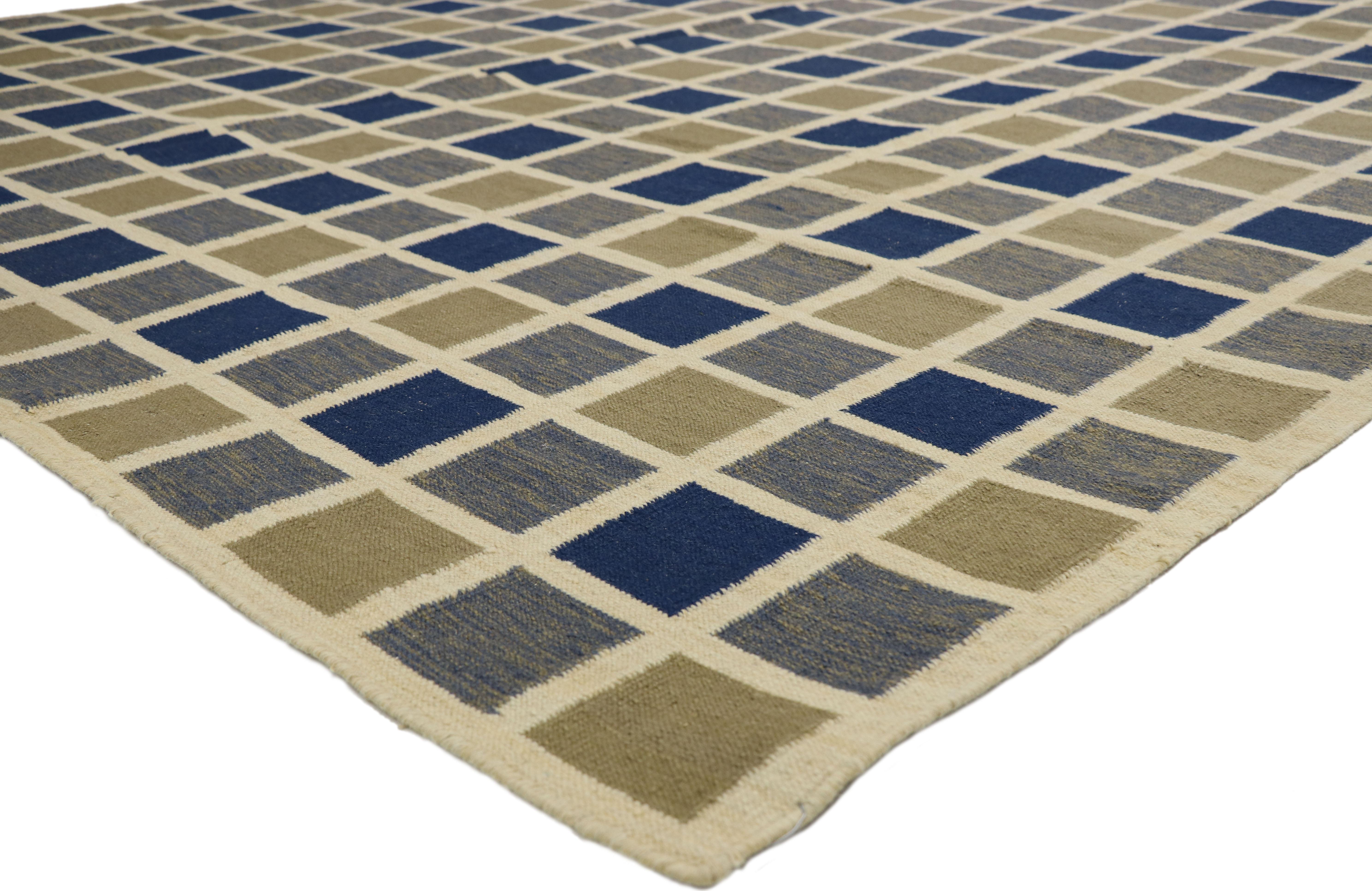 74923 Vintage Turkish Kilim Area Rug with Square Buffalo Plaid Pattern. With its all-over simple square buffalo plaid pattern, this hand-woven wool vintage Turkish kilim rug offers endless possibilities. The squares are rendered in variegated shades
