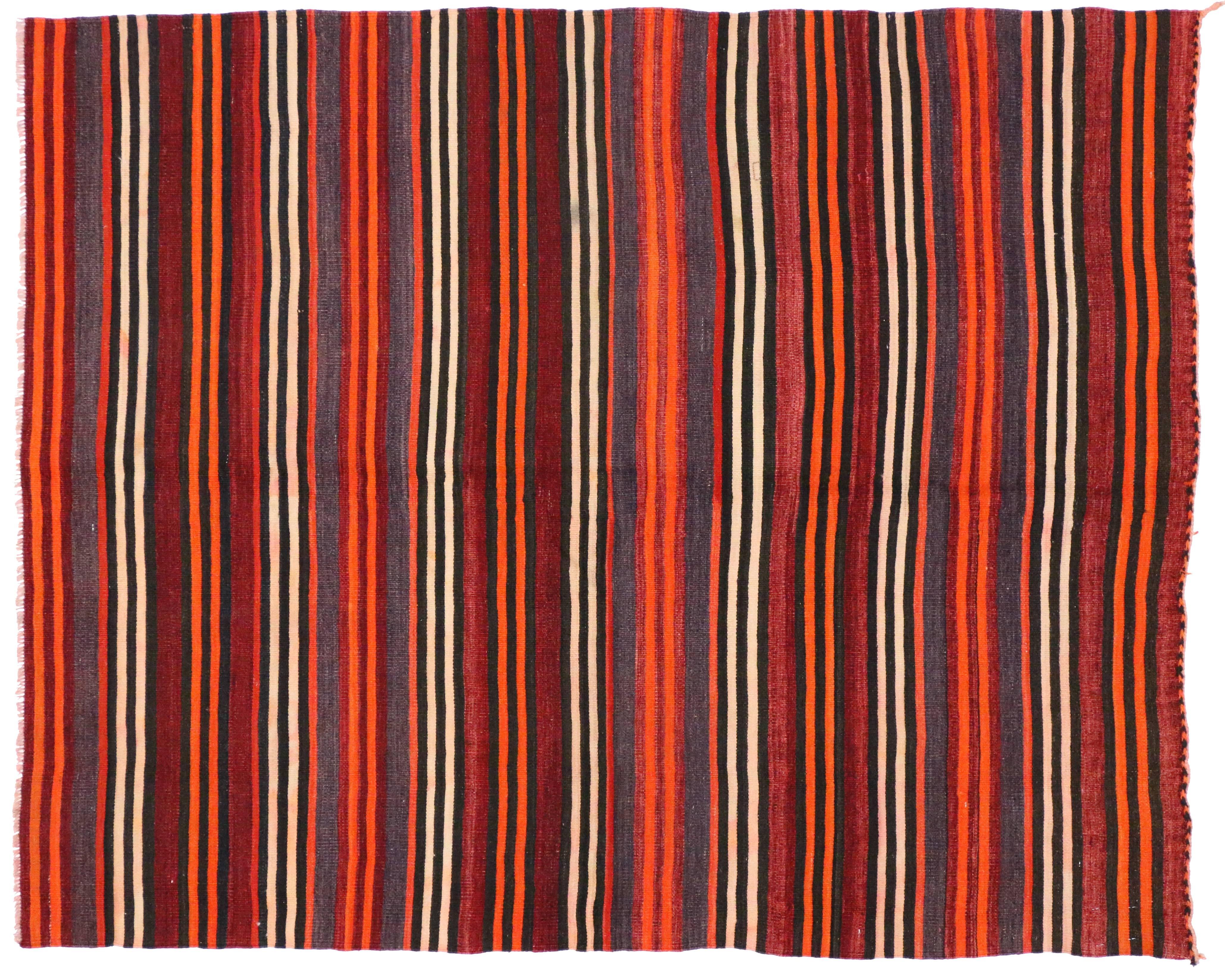 74874, vintage Turkish Kilim rug with stripes. This handwoven wool vintage Turkish kilim rug features alternating stripes in vibrant colors rendered in variegated shades of orange, dark red, black, creamy-beige and violet. The traditional Turkish