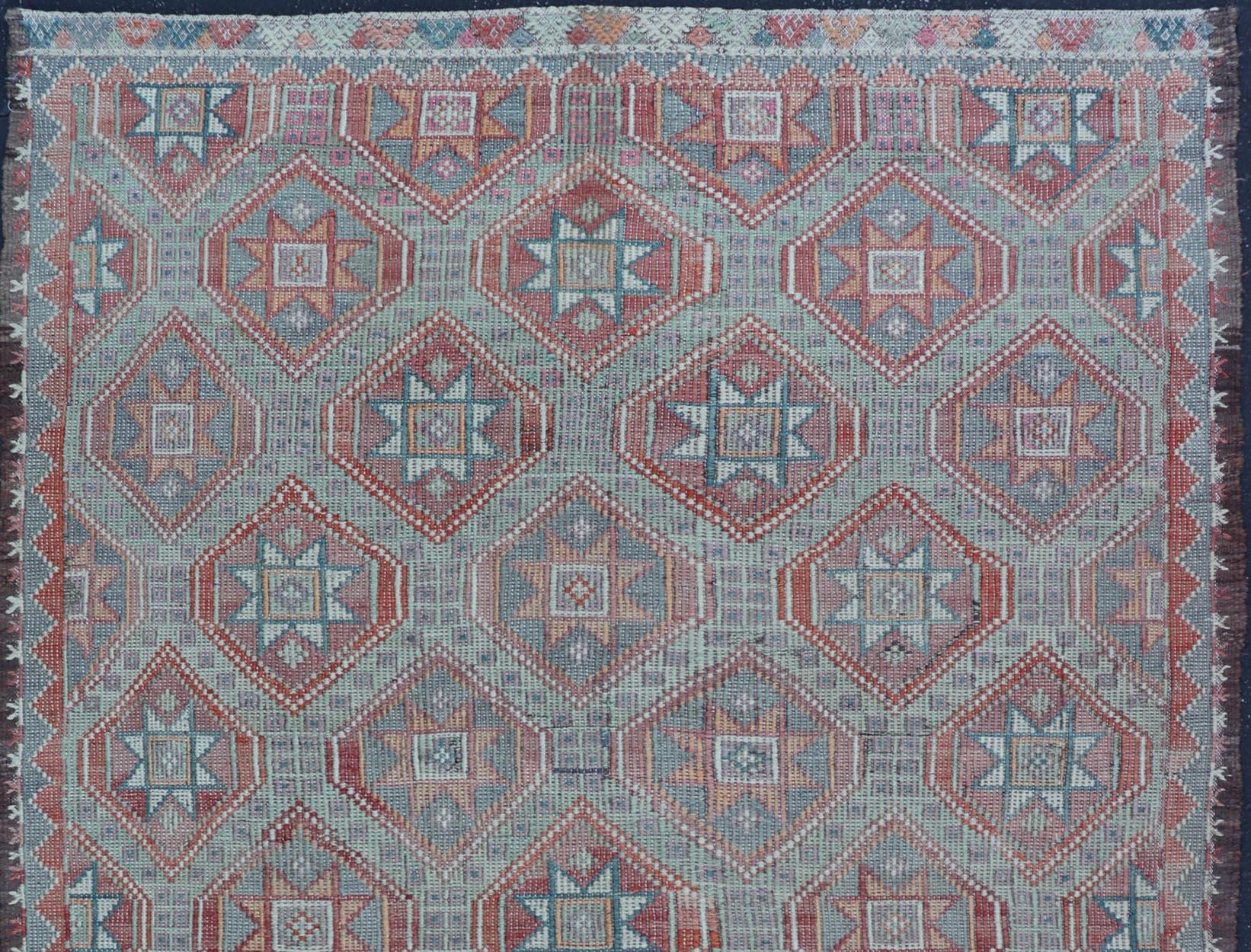Hand-Woven Vintage Turkish Kilim Rug With Vibrant Star Geometric Patterns 6'0 x 9'3 For Sale
