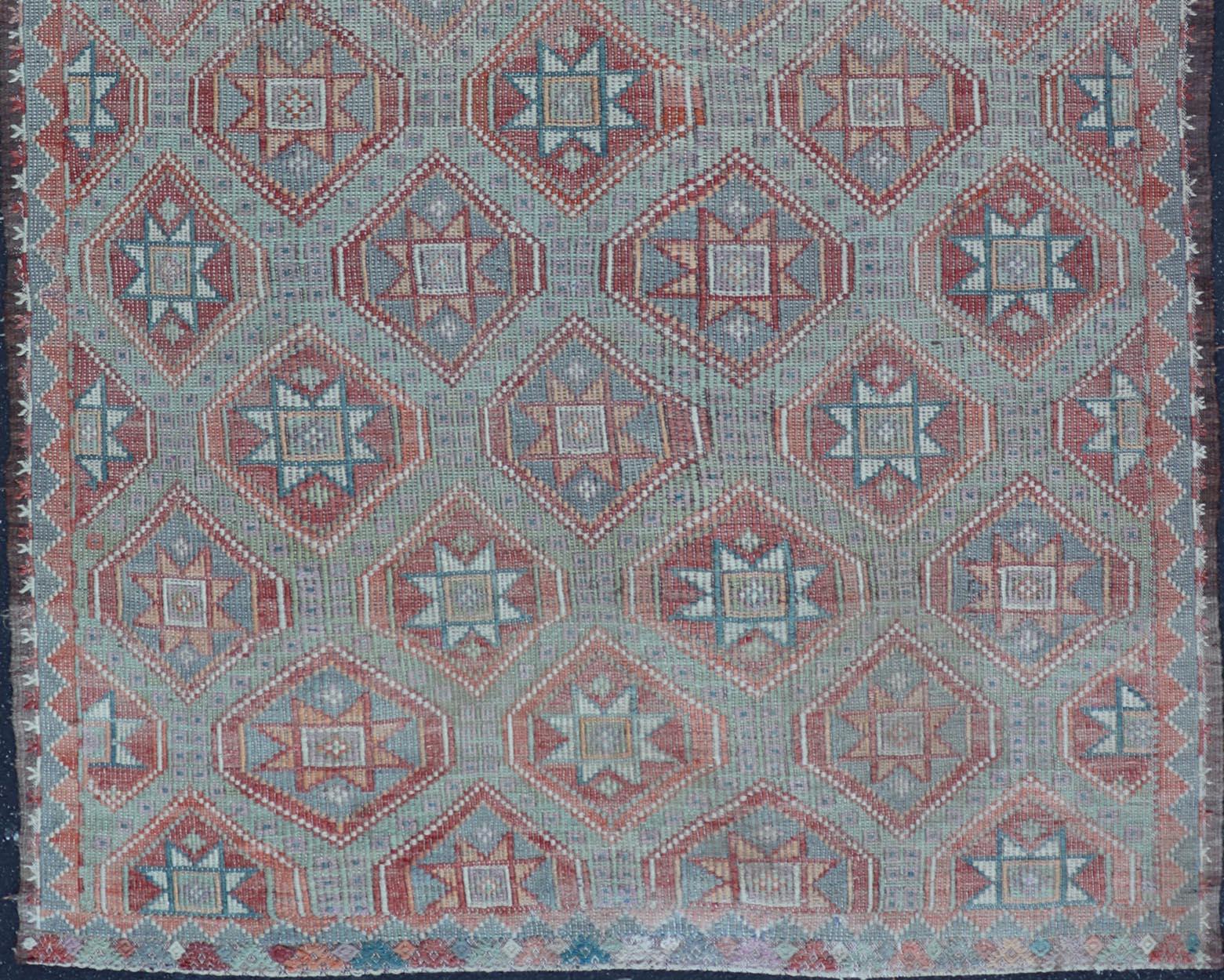 20th Century Vintage Turkish Kilim Rug With Vibrant Star Geometric Patterns 6'0 x 9'3 For Sale
