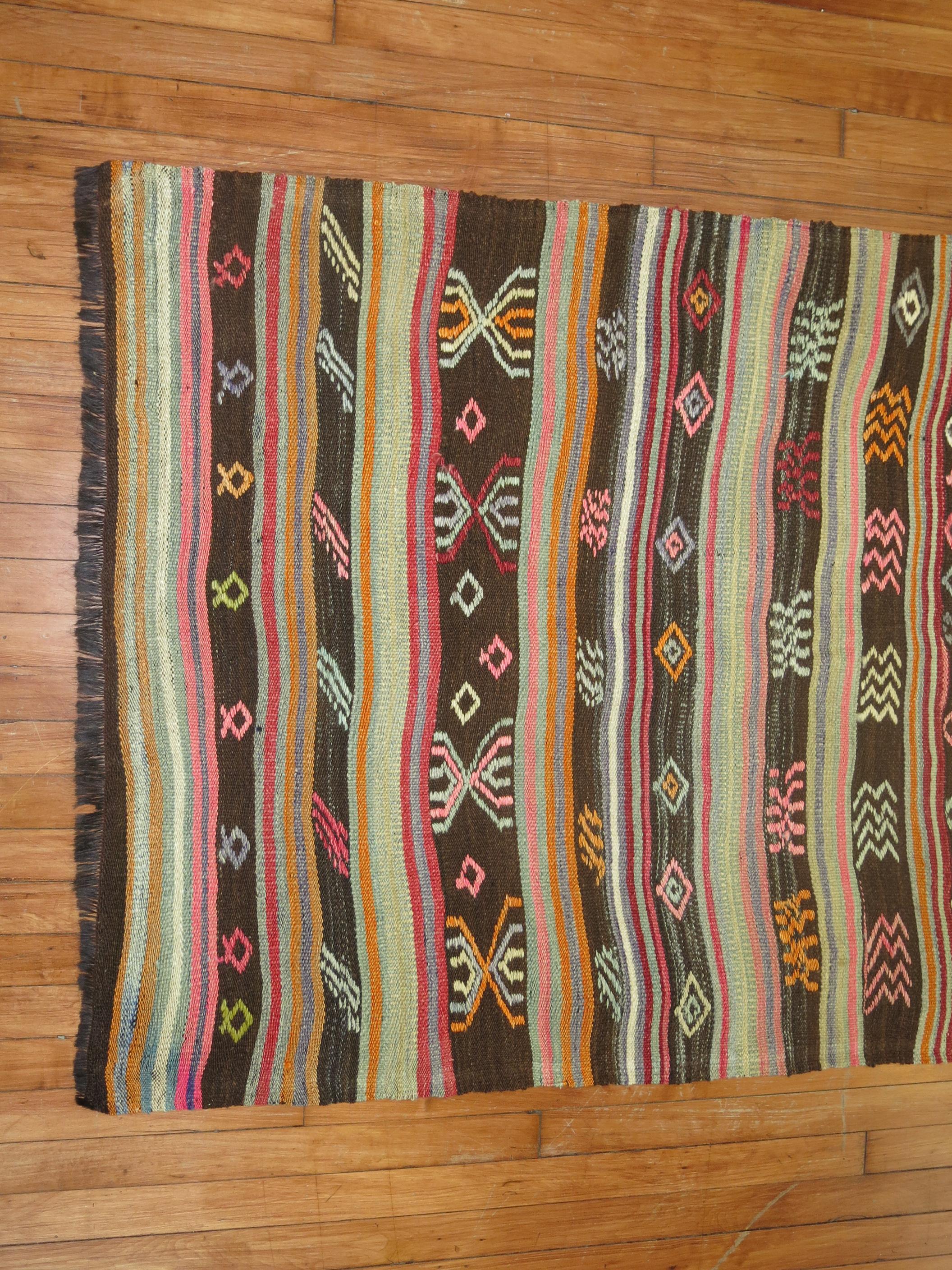 A one of a kind mid-20th century Turkish Kilim runner.

3'6'' x 9'5''