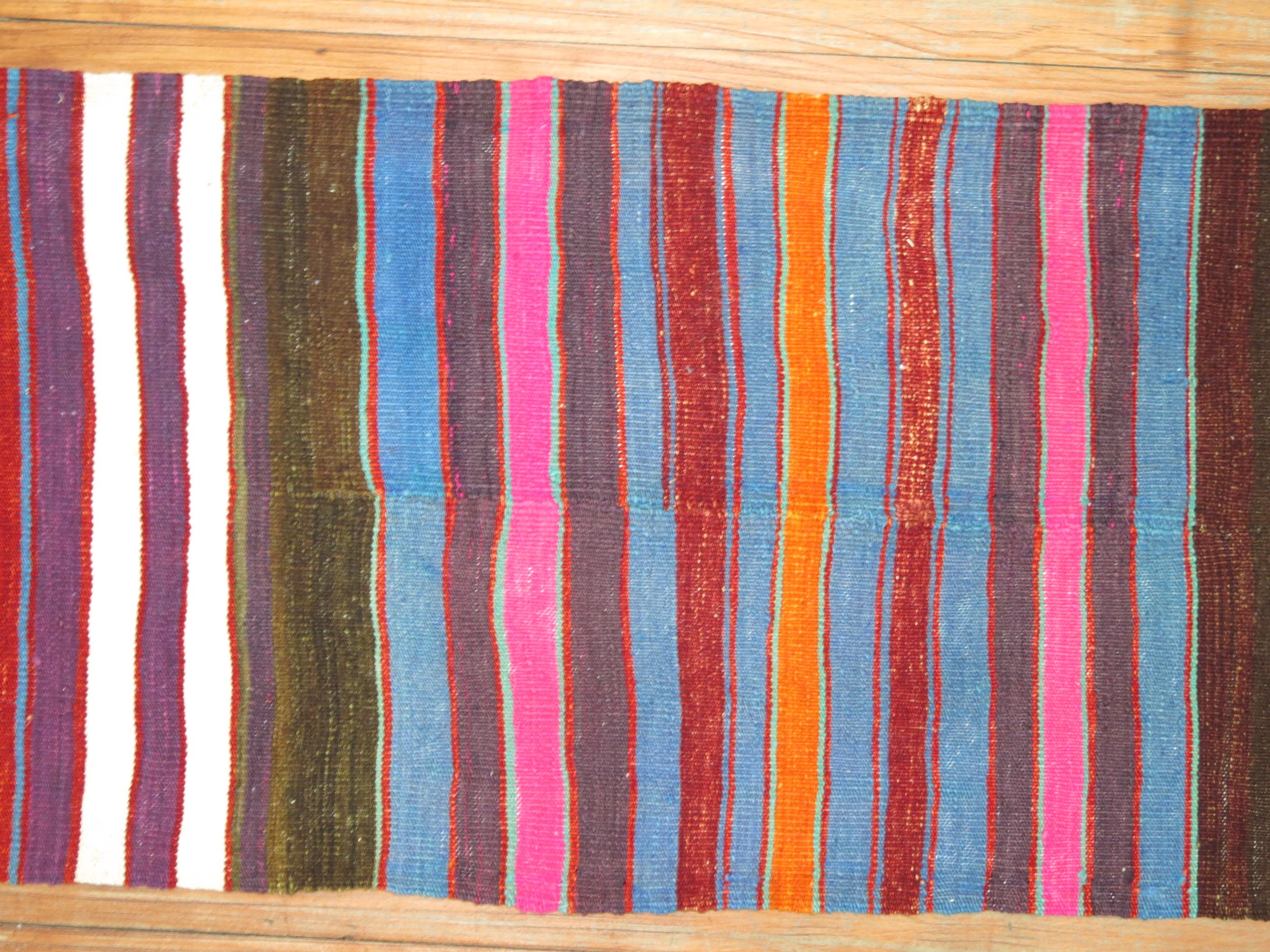 A one of a kind mid-20th century boho vibe Turkish Kilim runner.