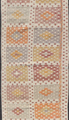 Vintage Turkish Kilim Runner with Checker Medallions in Soft Pastel Tones