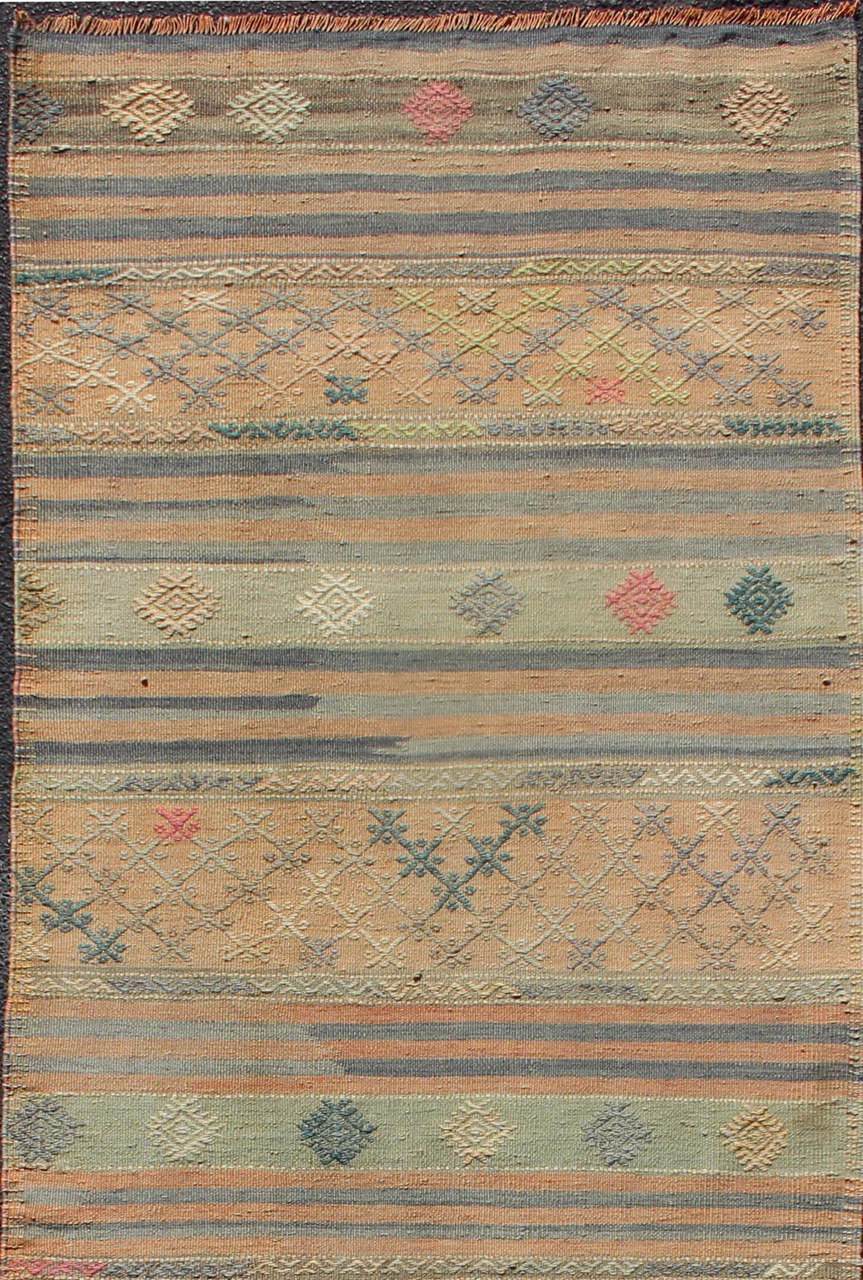 Vintage Turkish Kilim runner with geometric shapes and colorful stripes, Keivan Woven Arts / rug TU-NED-627, country of origin / type: turkey / Kilim, circa mid-20th century

Featuring geometric shapes rendered in a repeating horizontal stripe