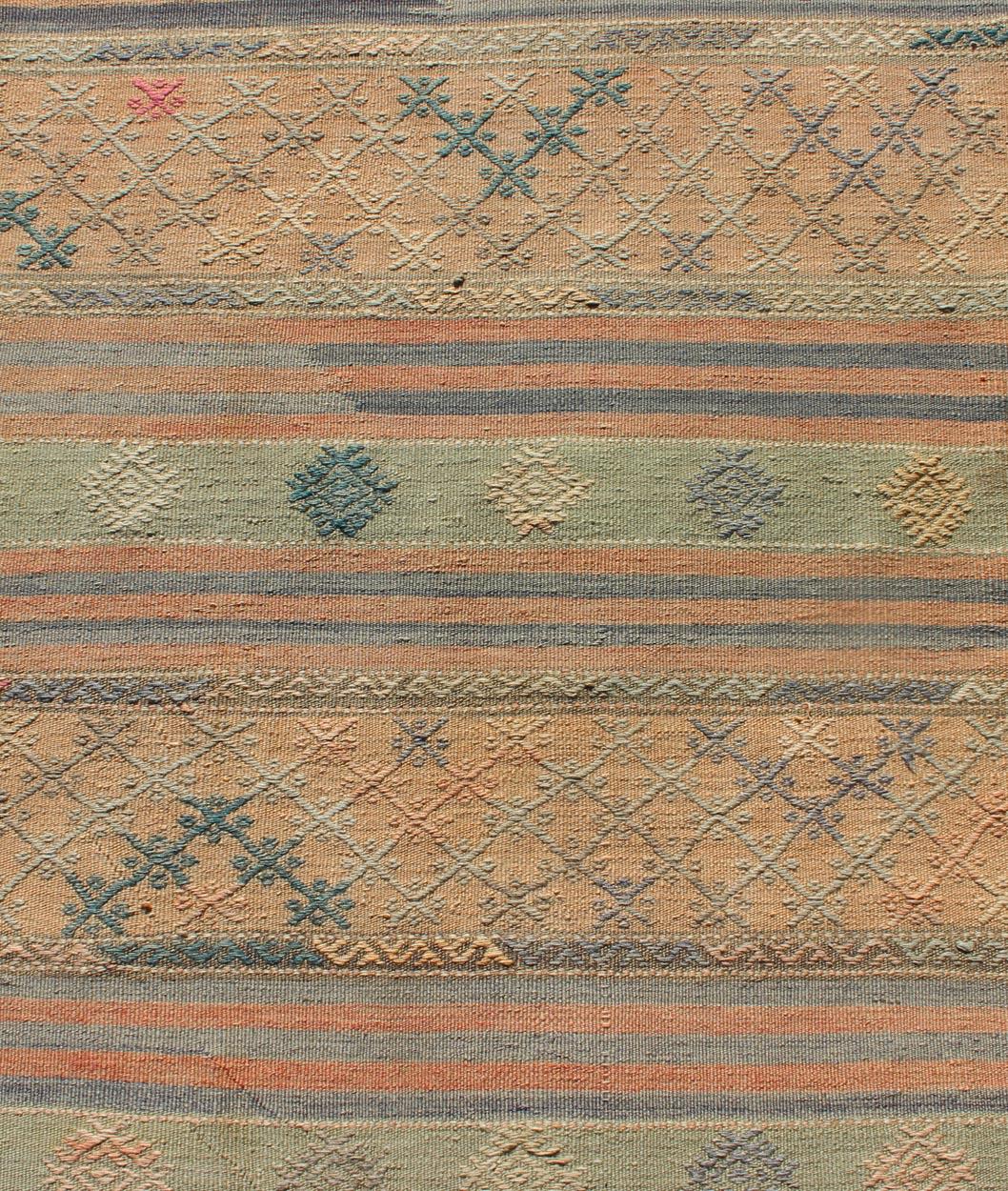 20th Century Vintage Turkish Kilim Runner with Geometric Design and Colorful Stripes For Sale