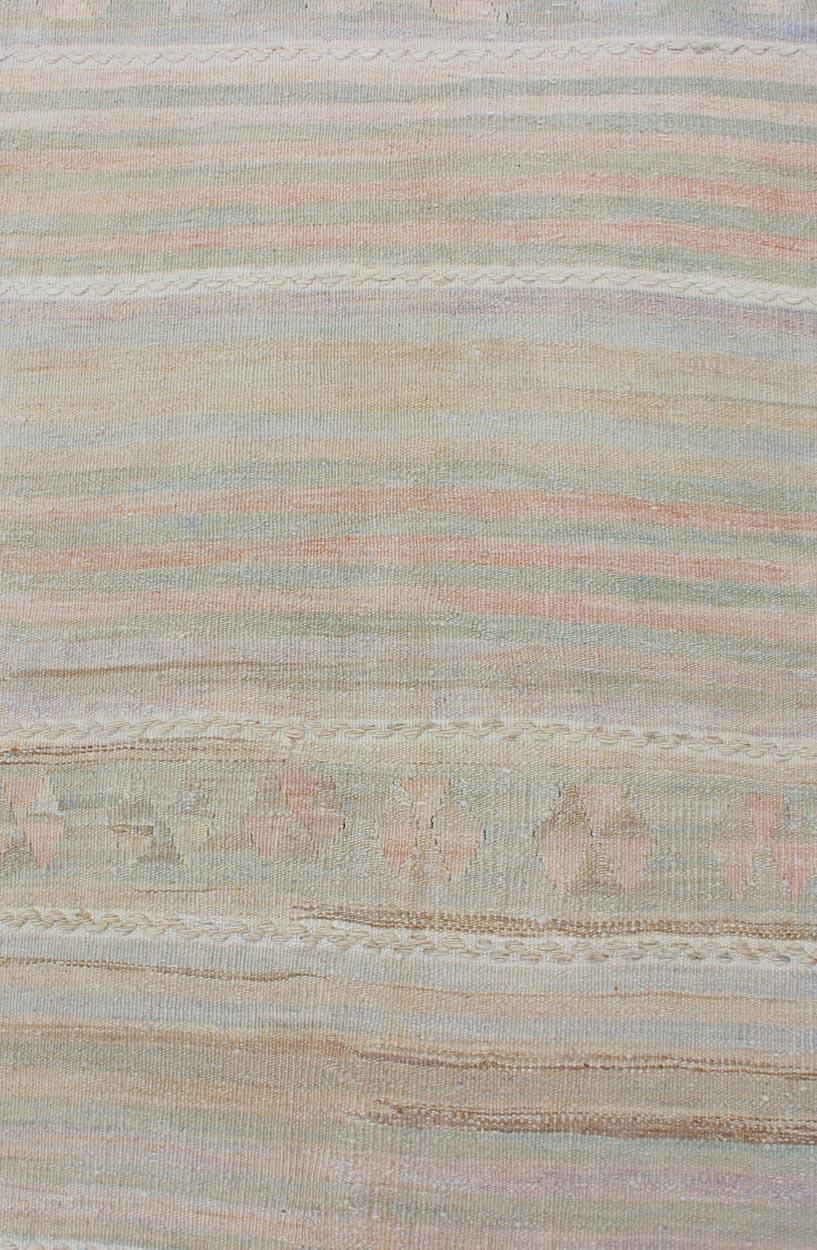 Wool Vintage Turkish Kilim Runner with Soft Stripes and Modern Design in Muted Colors For Sale