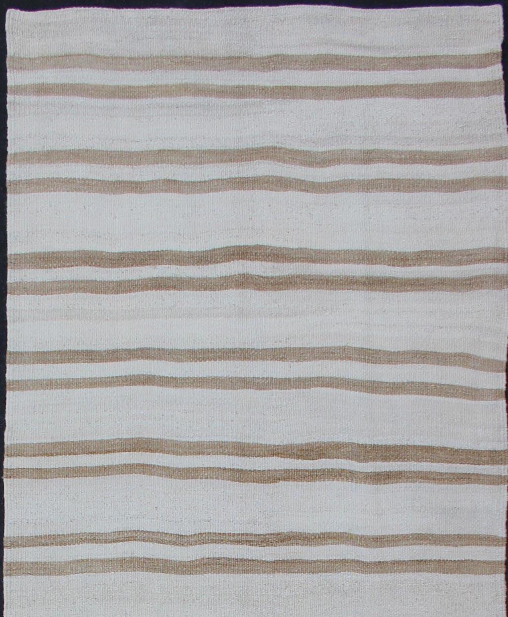 Stripe design Kilim runner in cream and taupe, Keivan Woven Arts / rug en-165951, country of origin / type: Turkey / Kilim, circa 1950

This flat-woven Kilim runner from Turkey features an exciting composition consisting of stripes rendered in