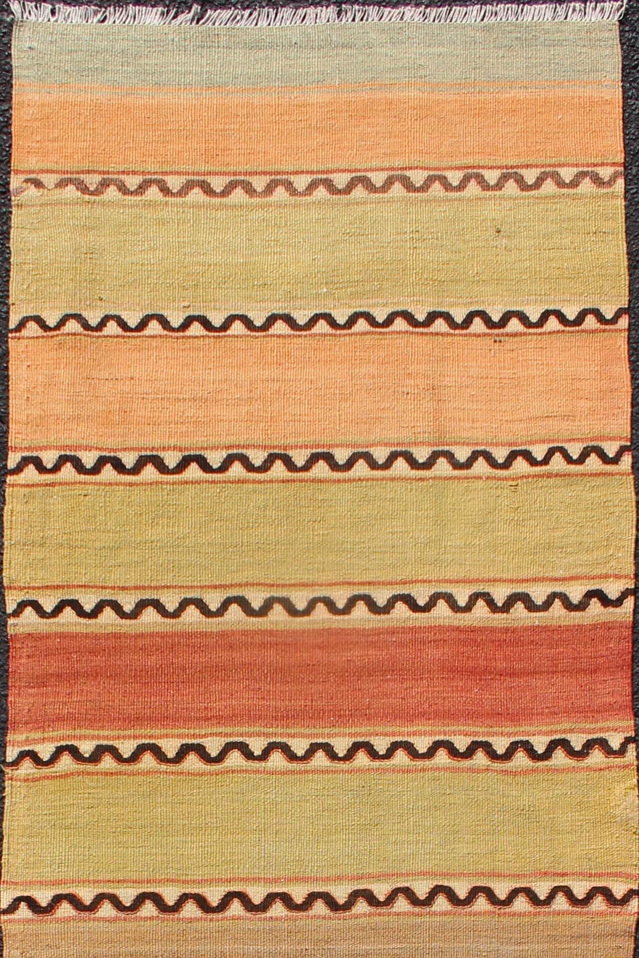 Turkish Kilim runner with stripes in red, green, yellow, orange, Keivan Woven Arts / rug TU-NED-635, country of origin / type: Turkey / Kilim, circa mid-20th century

Woven during the mid-20th century in Turkey, this Kilim is decorated with a