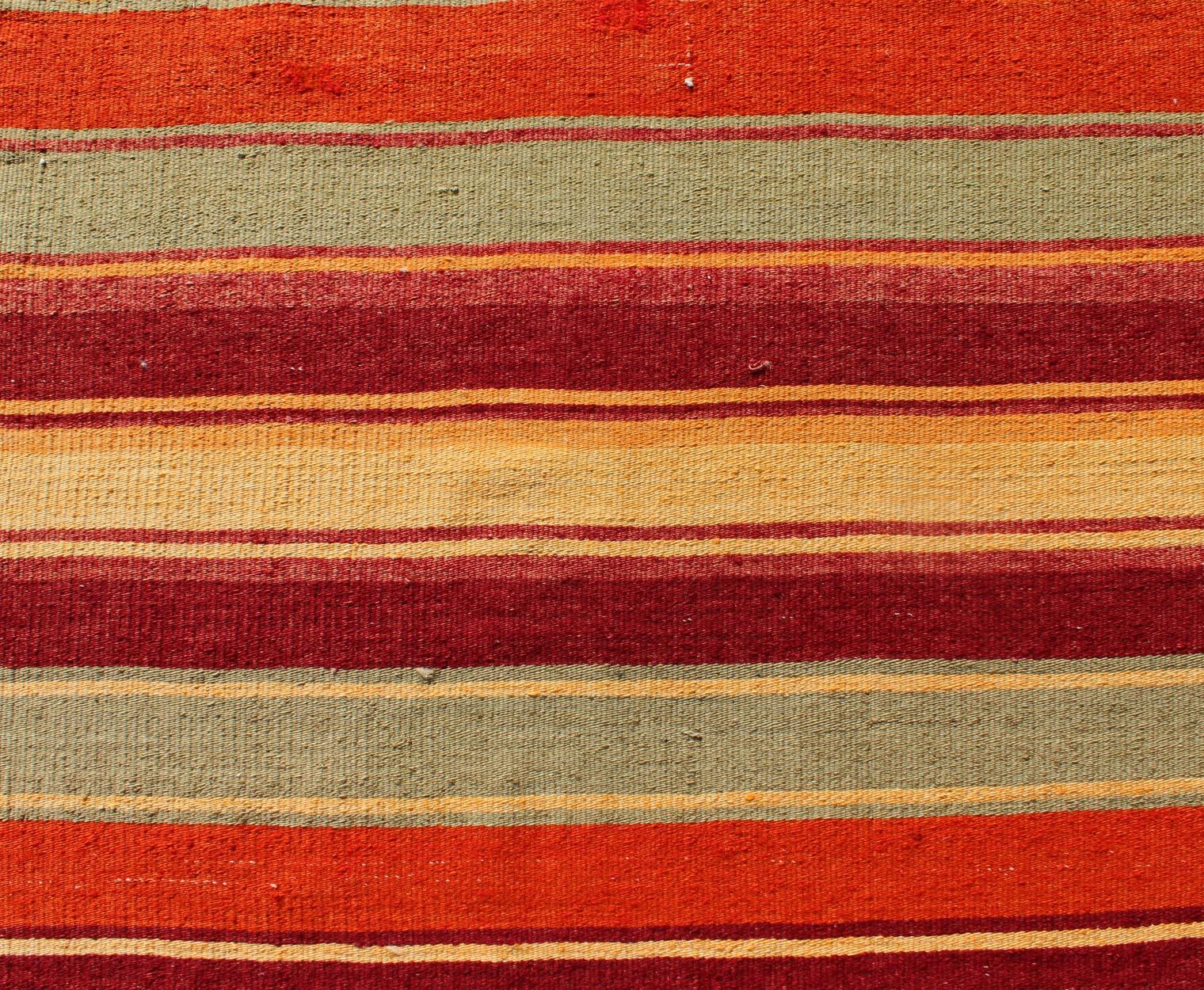 Wool Vintage Turkish Kilim Runner with Stripes in Red, Green, Yellow, and Orange For Sale