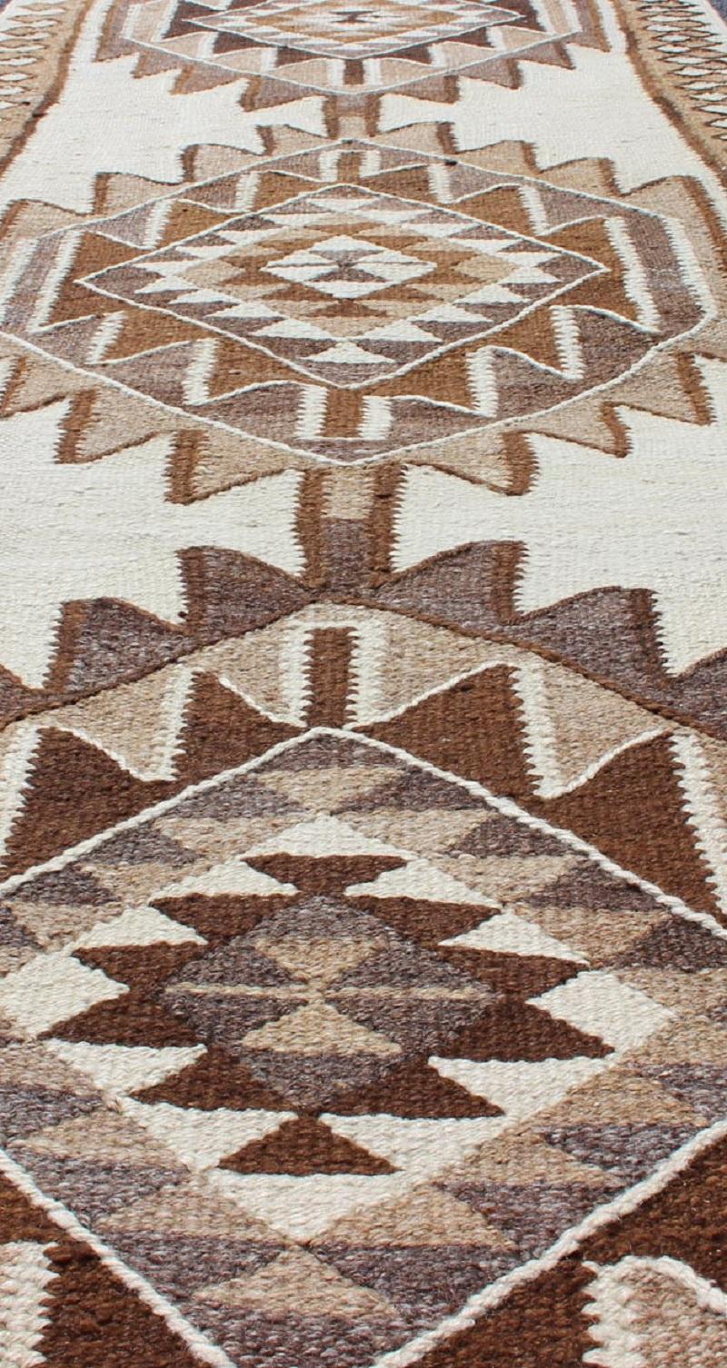 Wool Vintage Turkish Kilim Runner with Tribal Medallions in Shades of Brown and Cream For Sale