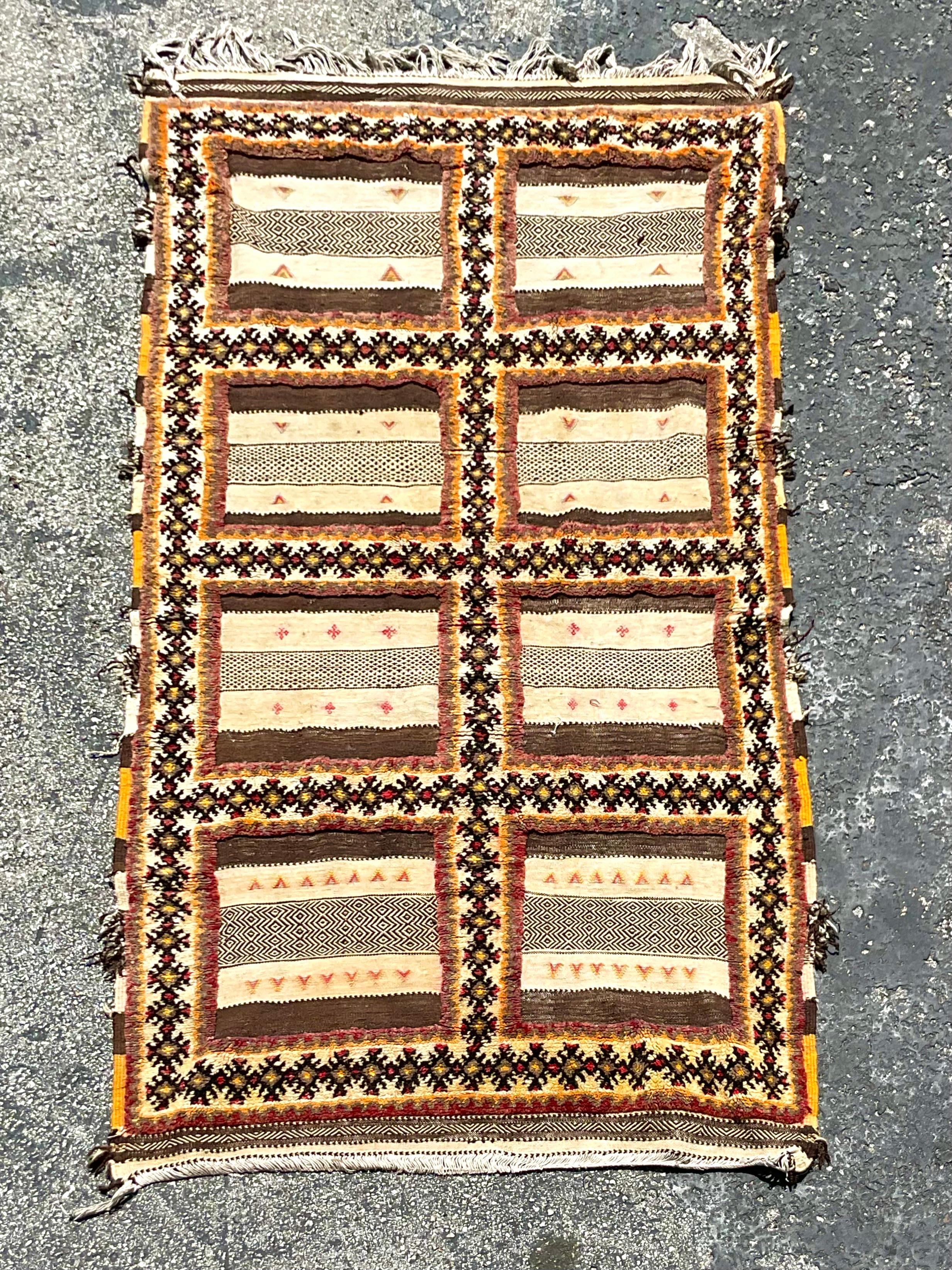 A beautiful Turkish striped rug with an intriguing pallet of vibrant and rich colorways. Acquired from a Palm Beach estate.