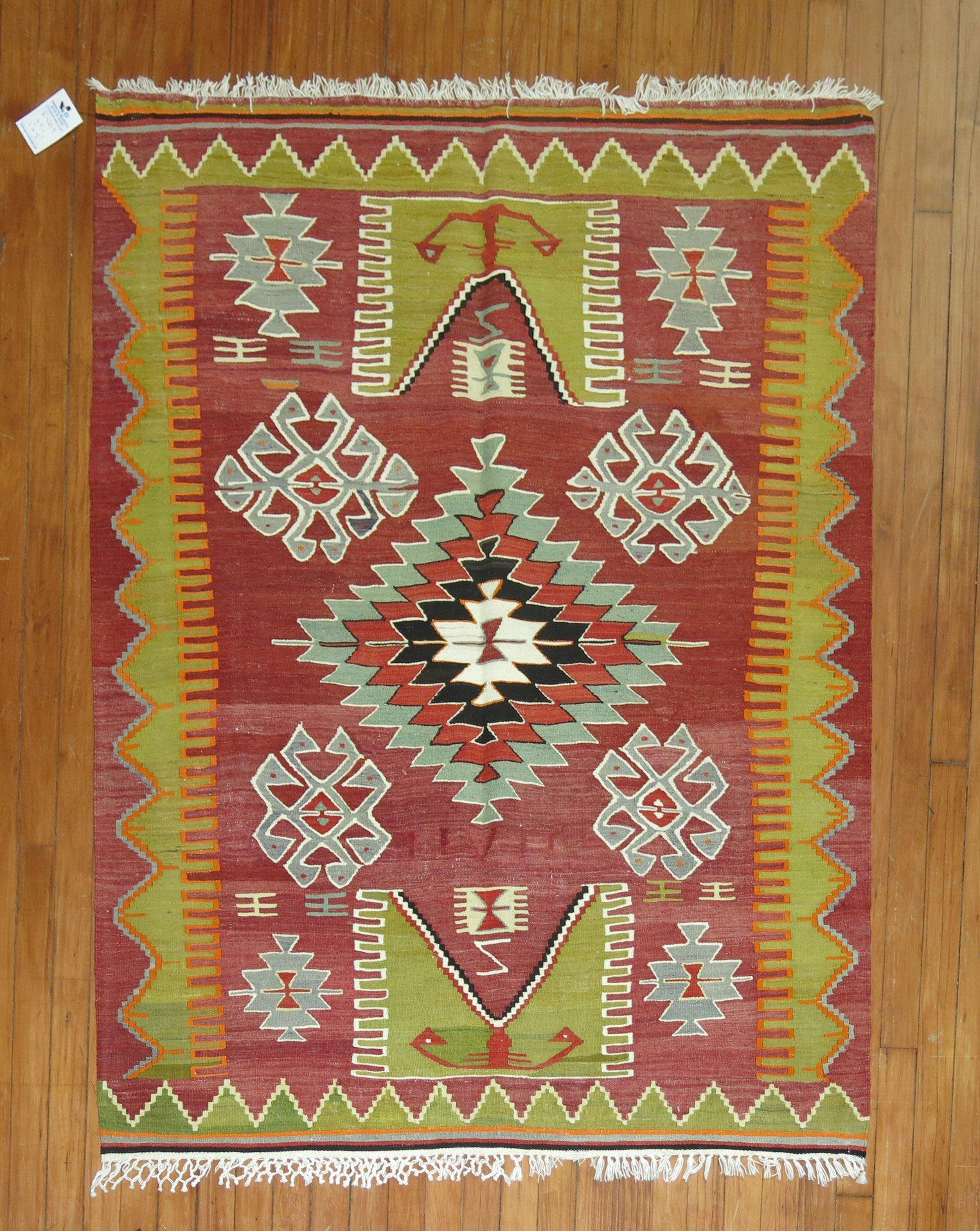 Colorful mid-20th century Turkish flat-weave Kilim with prayer motif.

Measures: 2'11