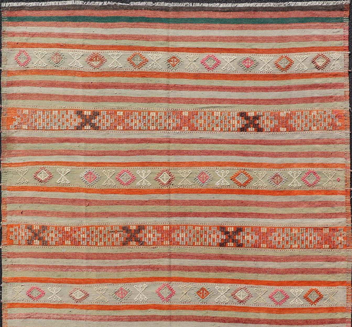 Vintage Turkish large Kilim rug with geometric shapes and colorful stripes, rug TU-NED-1030, country of origin / type: turkey / Kilim, circa mid-20th century

Measures:6'8 x 11'4.