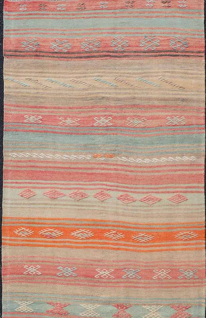 Hand Woven vintage Turkish Kilim in colors with hand woven motifs with stripes, Keivan Woven Arts / rug EN-P13733, country of origin / type: Turkey / Kilim, circa Mid-20th Century.

Measures: 2'11 x 10'0.
