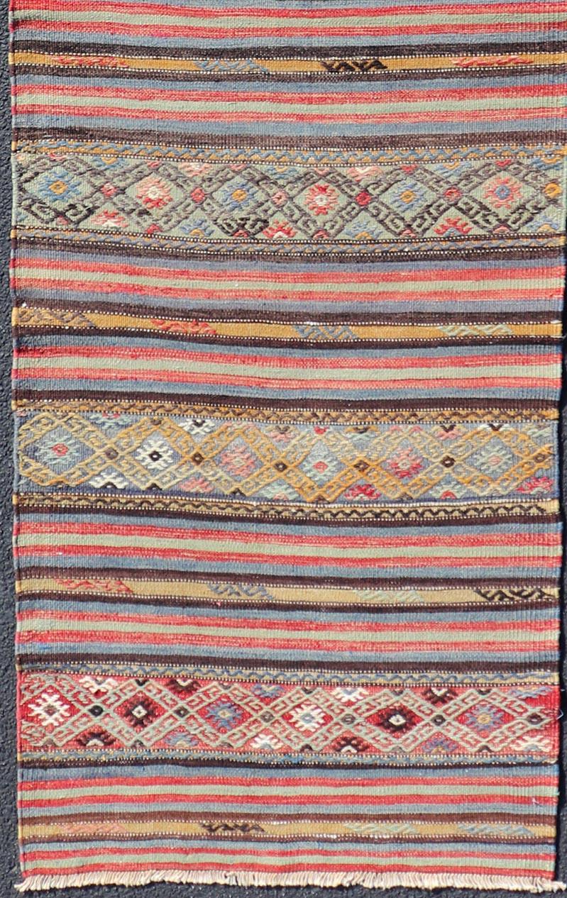 20th Century Vintage Turkish Kilim with Horizontal Stripes and Tribal Motifs in Bright Tones For Sale