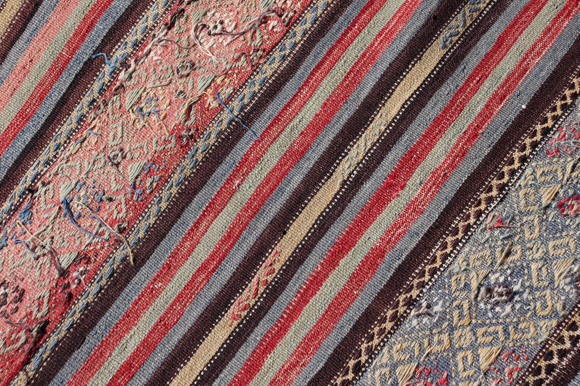 Wool Vintage Turkish Kilim with Horizontal Stripes and Tribal Motifs in Bright Tones For Sale