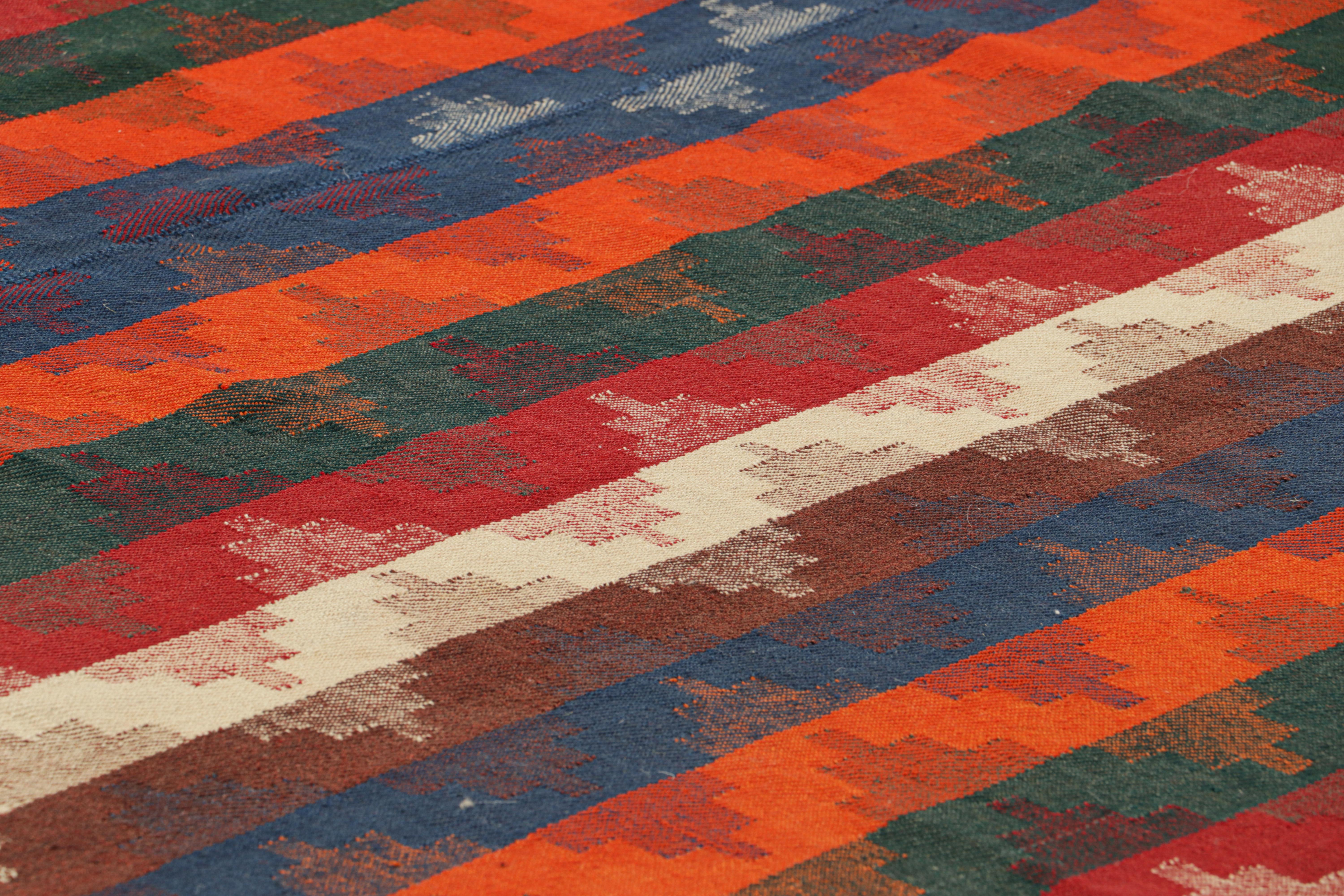 Handwoven in wool, circa 1950-1960, this 6x7 vintage Turkish kilim, is a collectible piece featuring polychromatic geometric chevrons and stripes. 

On the Design: 

Connoisseurs will admire this personal vintage piece meant to catch the eye, yet