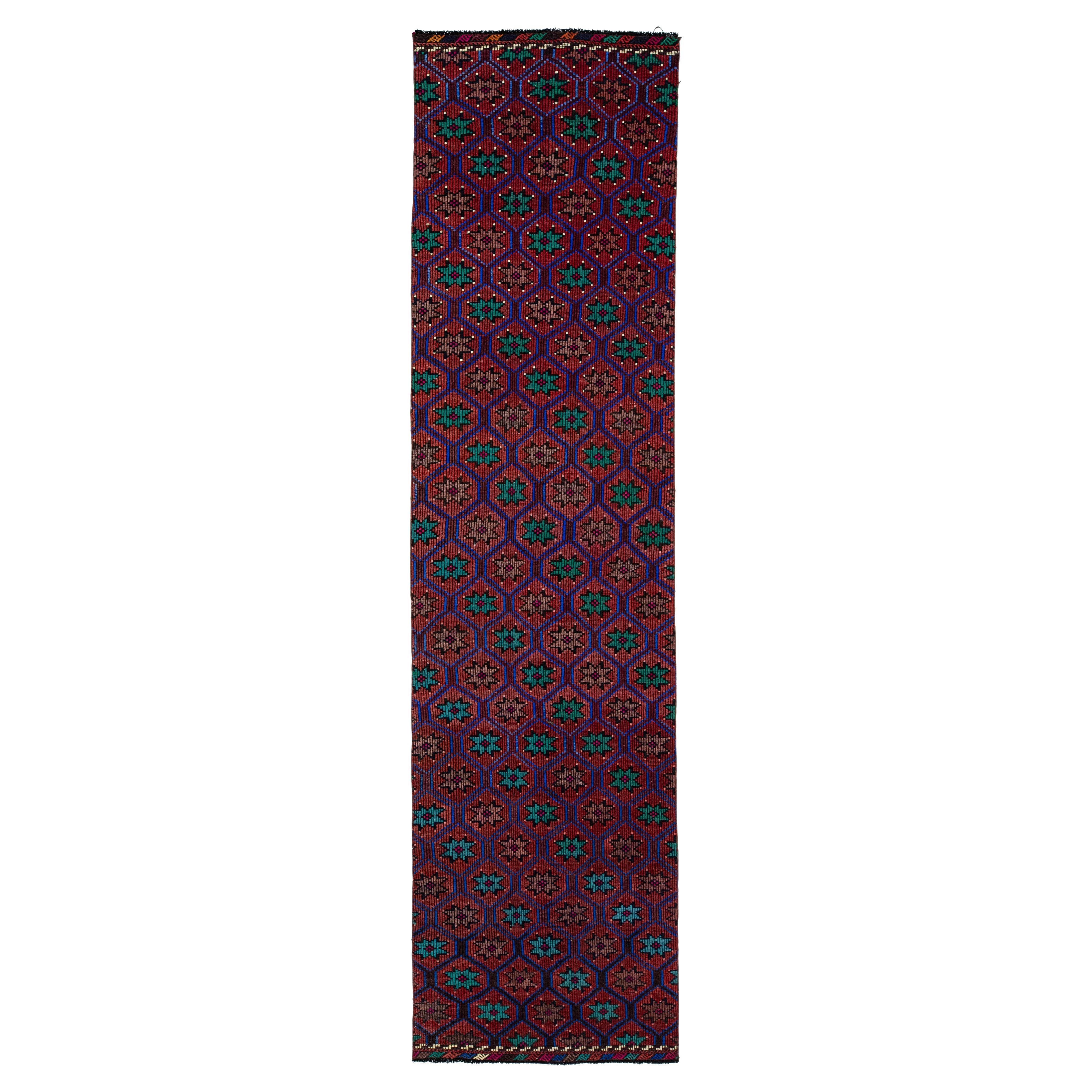 Tapis turc Kilim vintage en laine rouille avec motif géométrique