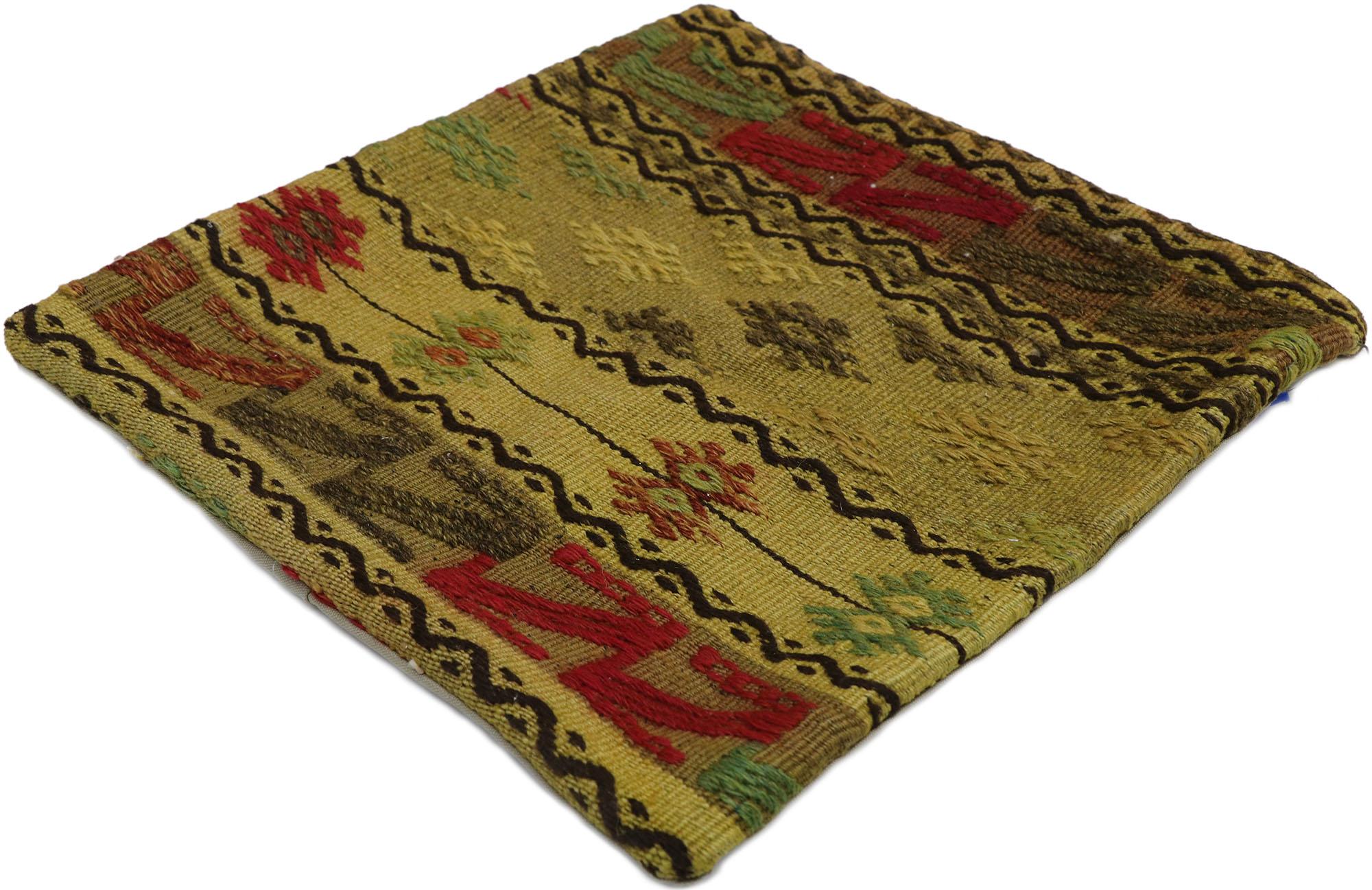 53638 Vintage Turkish Kilim Rug Pillow Cover, 01'05 x 01'06. This exquisite handwoven wool vintage Turkish kilim rug pillow cover is a treasure trove of cultural richness and artisanal craftsmanship. With its vivid geometric tribal design, the
