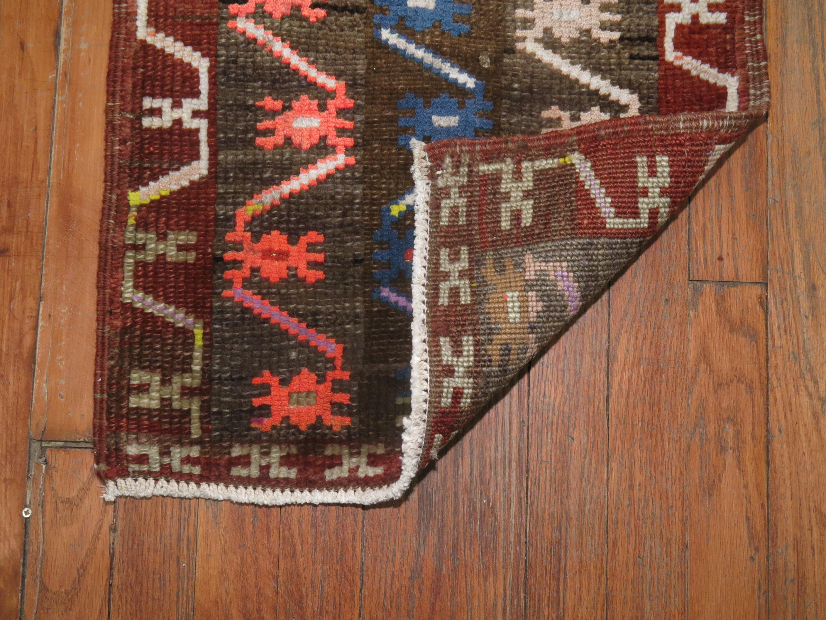 Eclectic Turkish Anatolian rug featuring sparkling accent colors.

1'7'' x 2'7'' circa mid 20th century